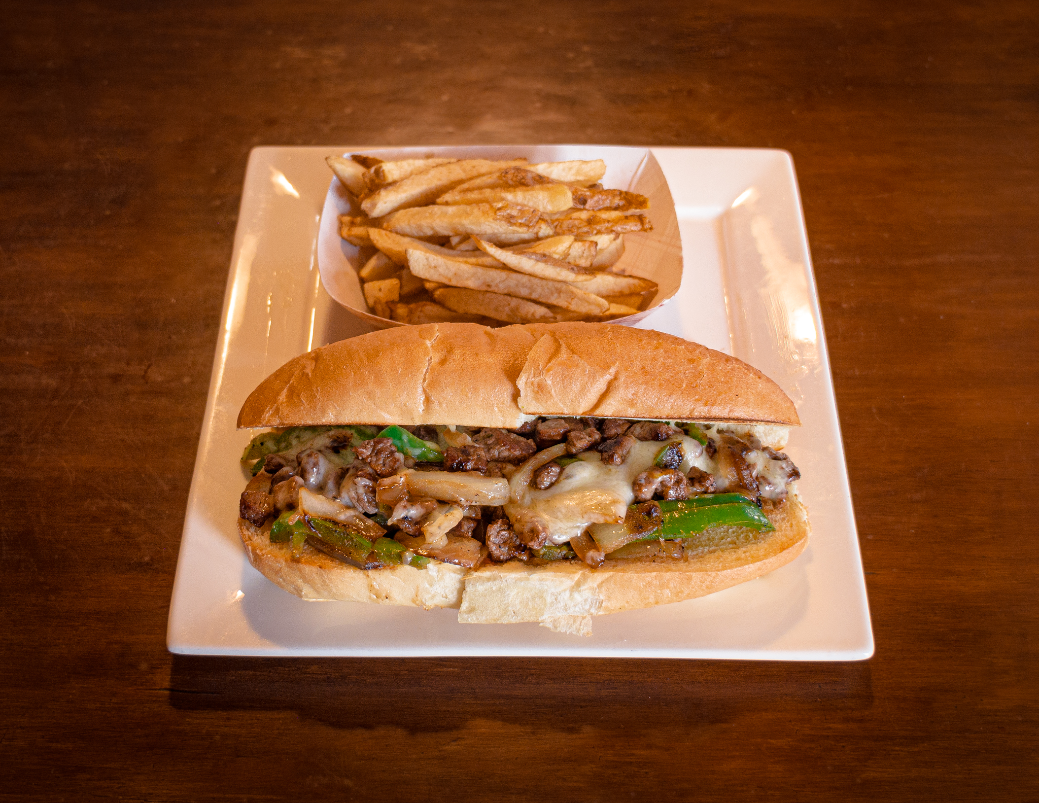 Order Philly Cheese Steak Sandwich food online from Pork Store Cafe store, San Francisco on bringmethat.com
