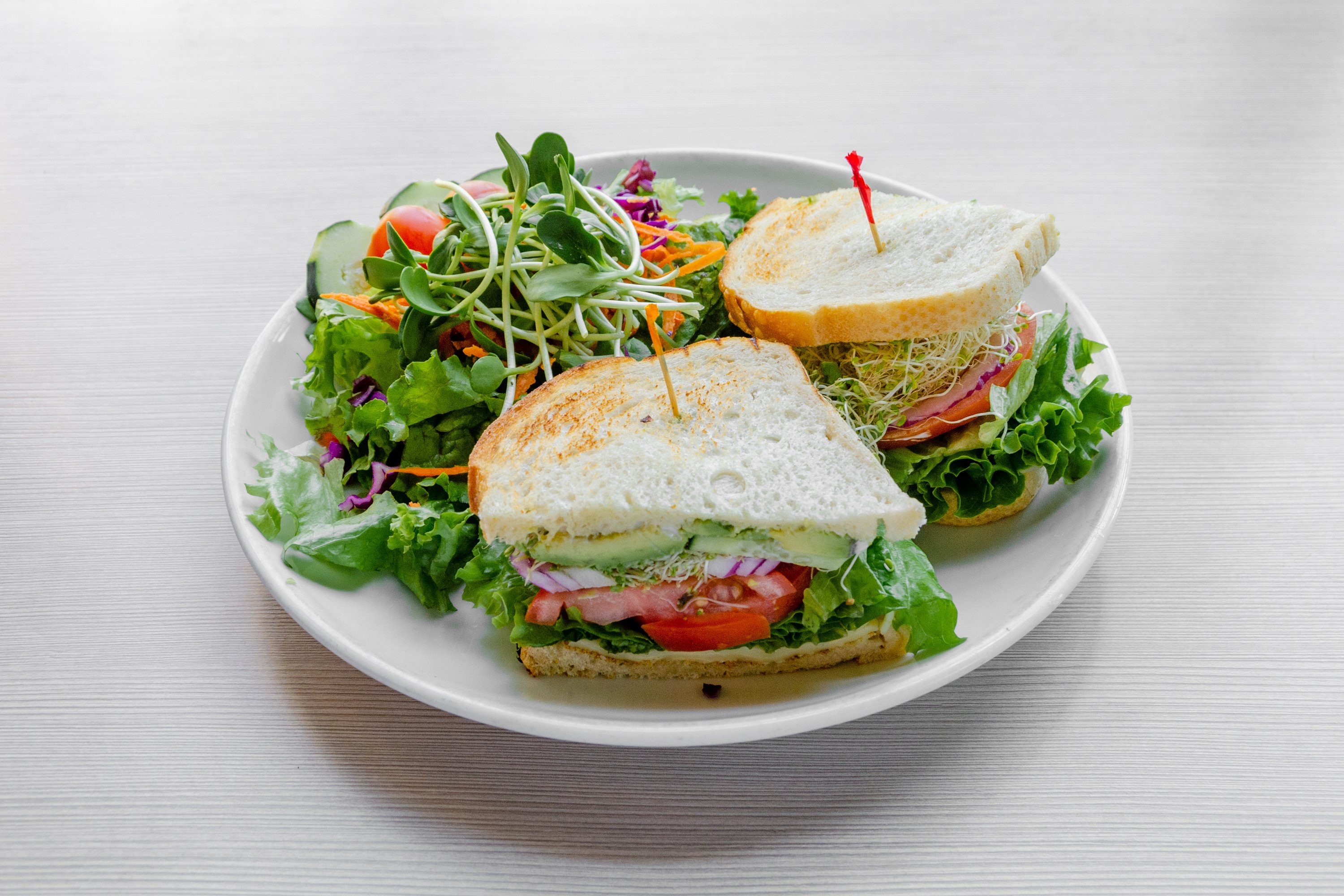 Order California Delight Sandwich* food online from Swami Cafe store, San Diego on bringmethat.com