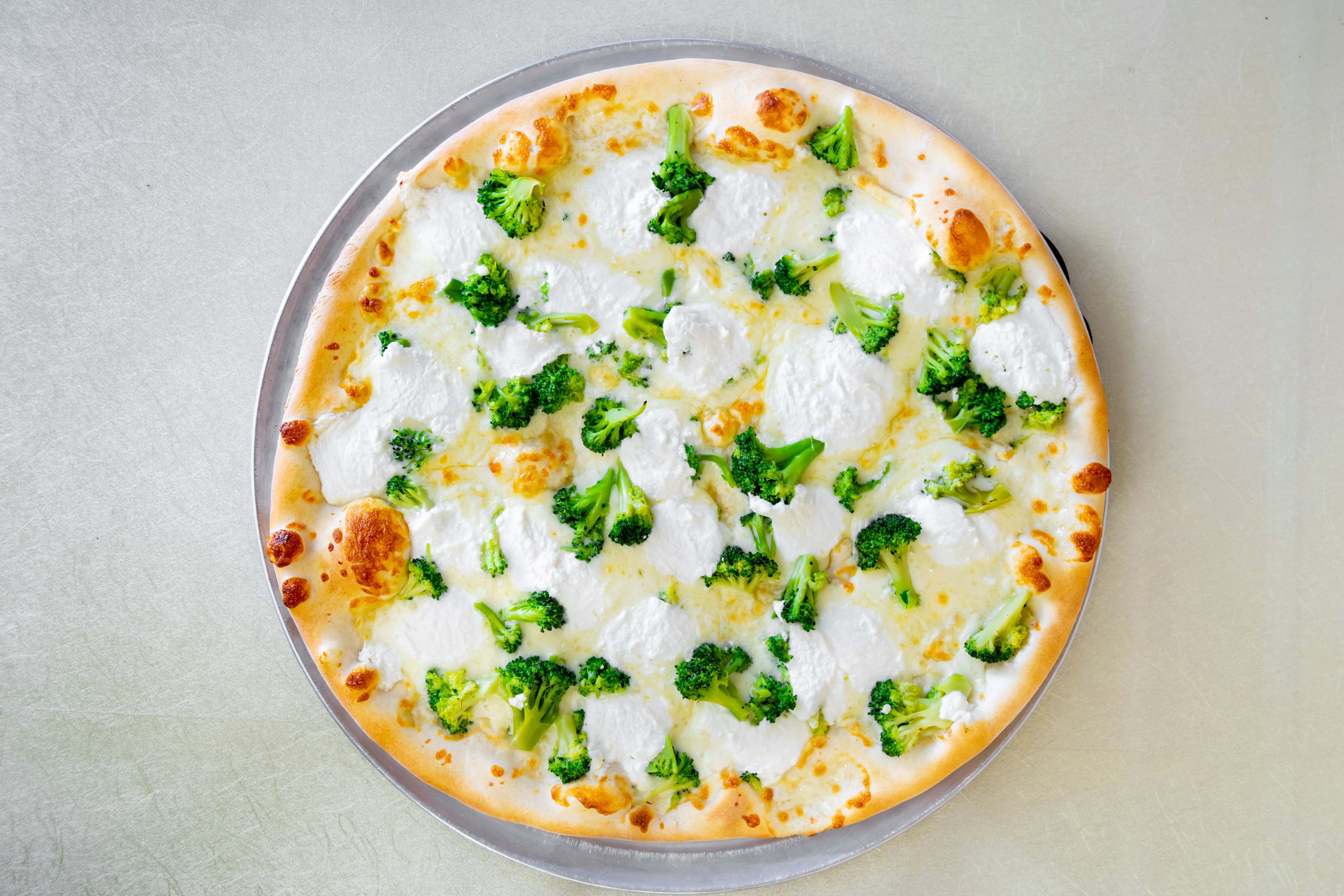 Order White Pizza with Broccoli - Small food online from Luigi New York Style Pizza store, South Plainfield on bringmethat.com