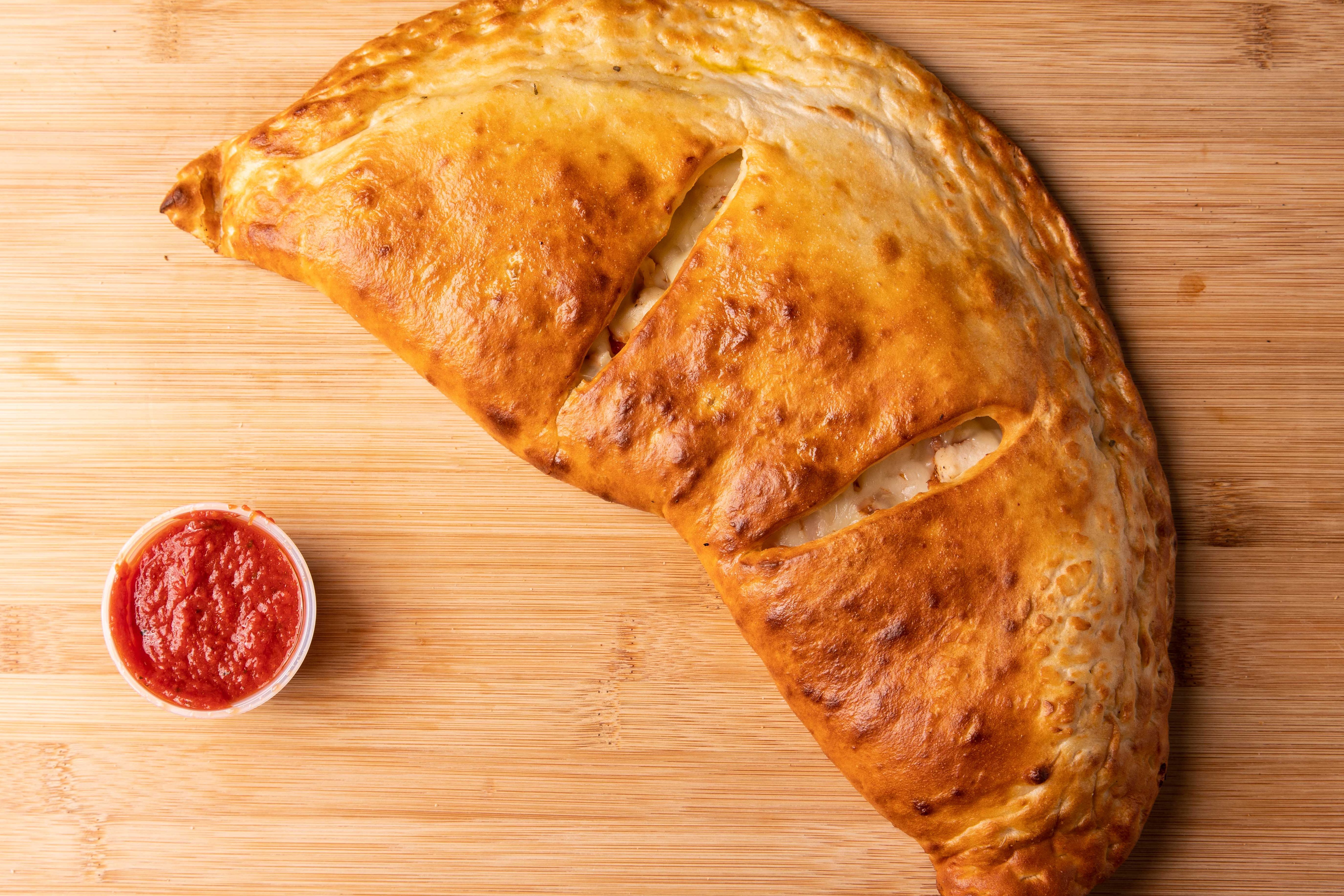 Order Chicken Calzone food online from Best Pizza store, Atlanta on bringmethat.com