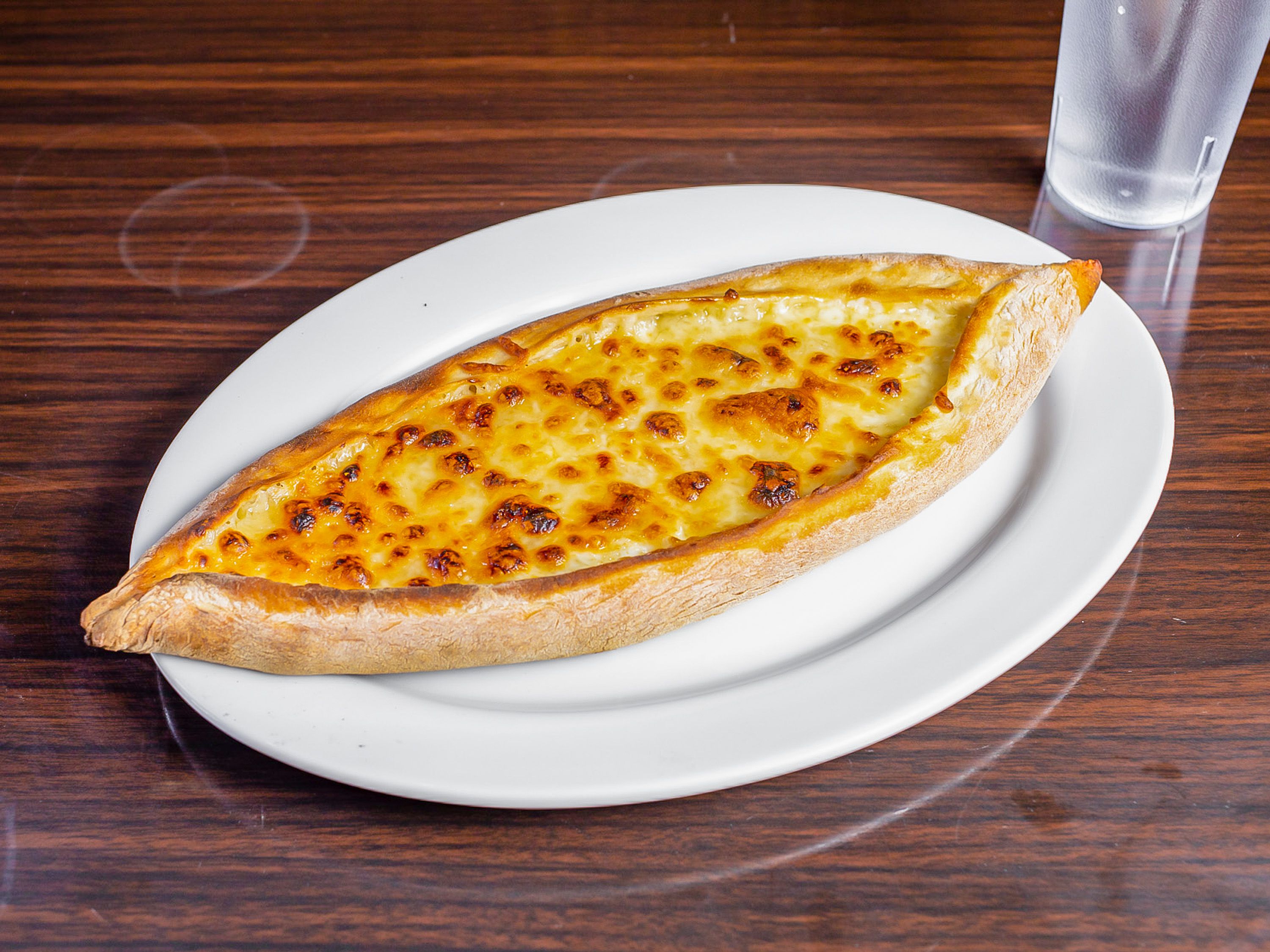 Order Sweet and Mozzarella Pide food online from Geary Kebab House store, San Francisco on bringmethat.com