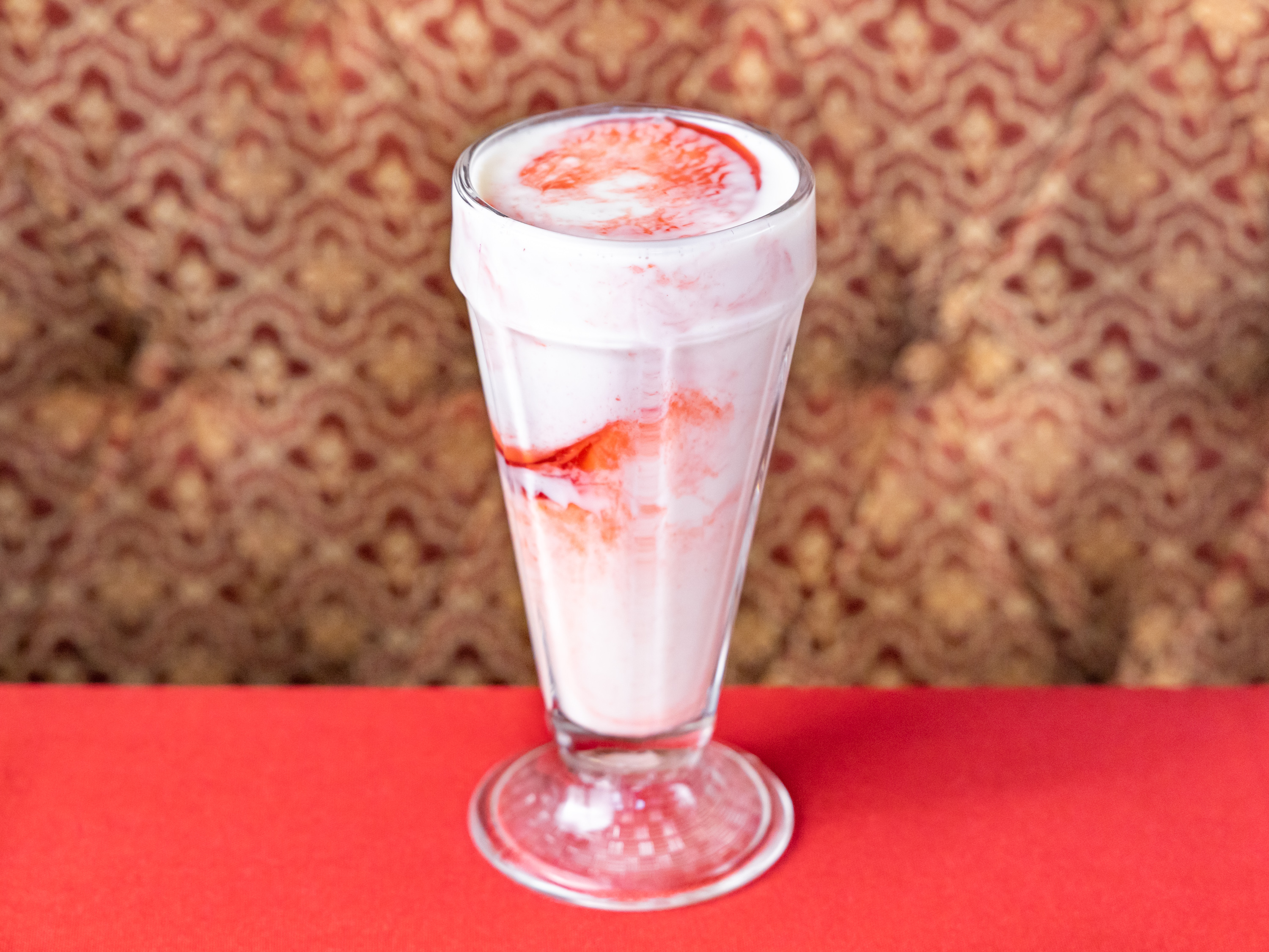 Order Strawberry Lassi food online from Lal Mirch Indian Restaurant store, Agoura Hills on bringmethat.com