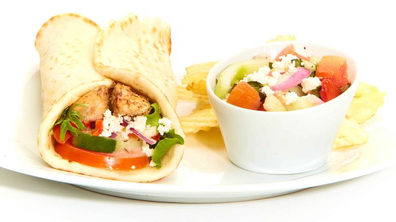 Order Greek Salad Gyro with Chicken food online from Taziki Mediterranean Cafe store, Memphis on bringmethat.com
