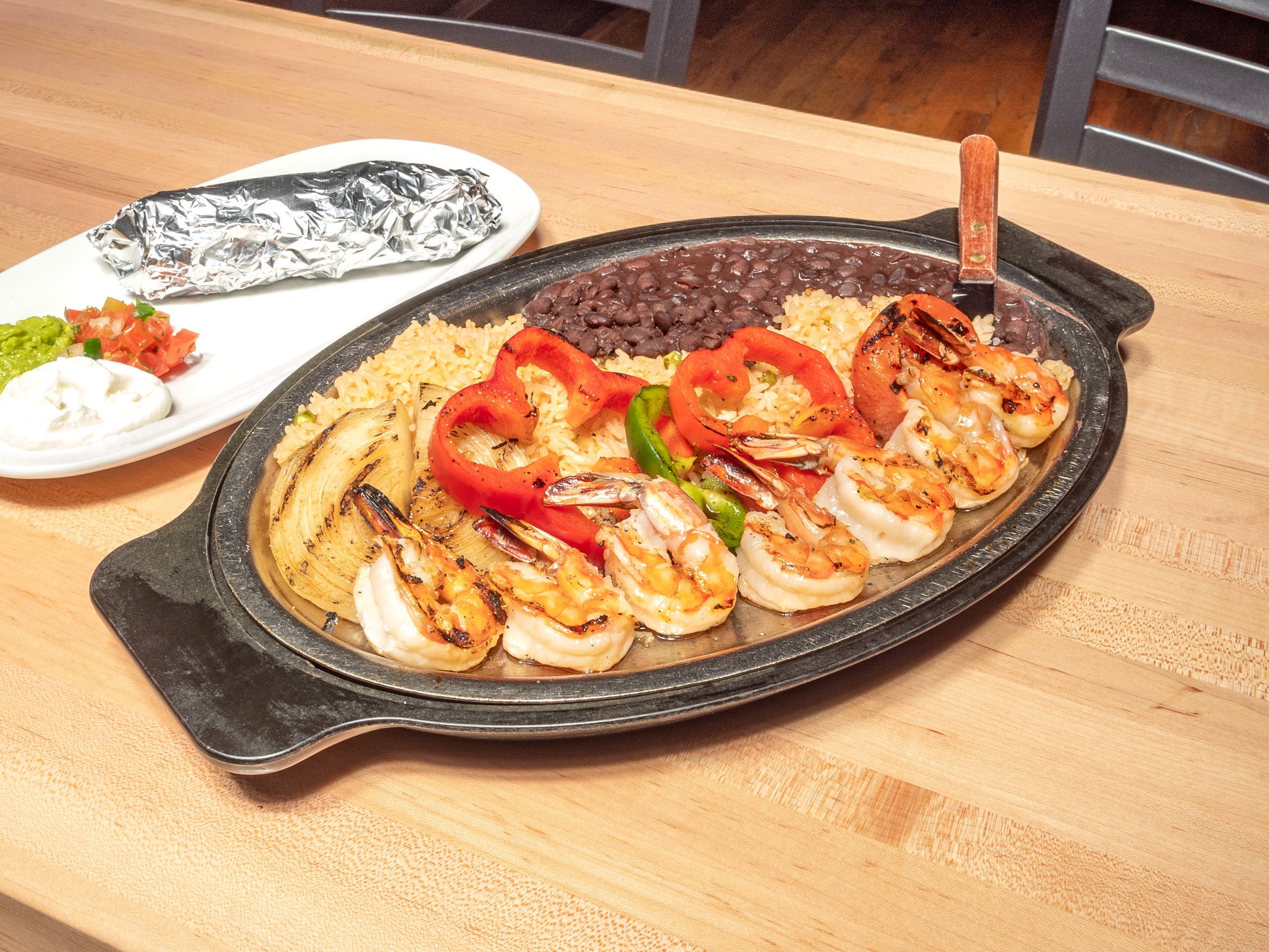 Order Grilled Shrimp Fajitas food online from The Rio Grande Mexican Restaurant store, Lone Tree on bringmethat.com
