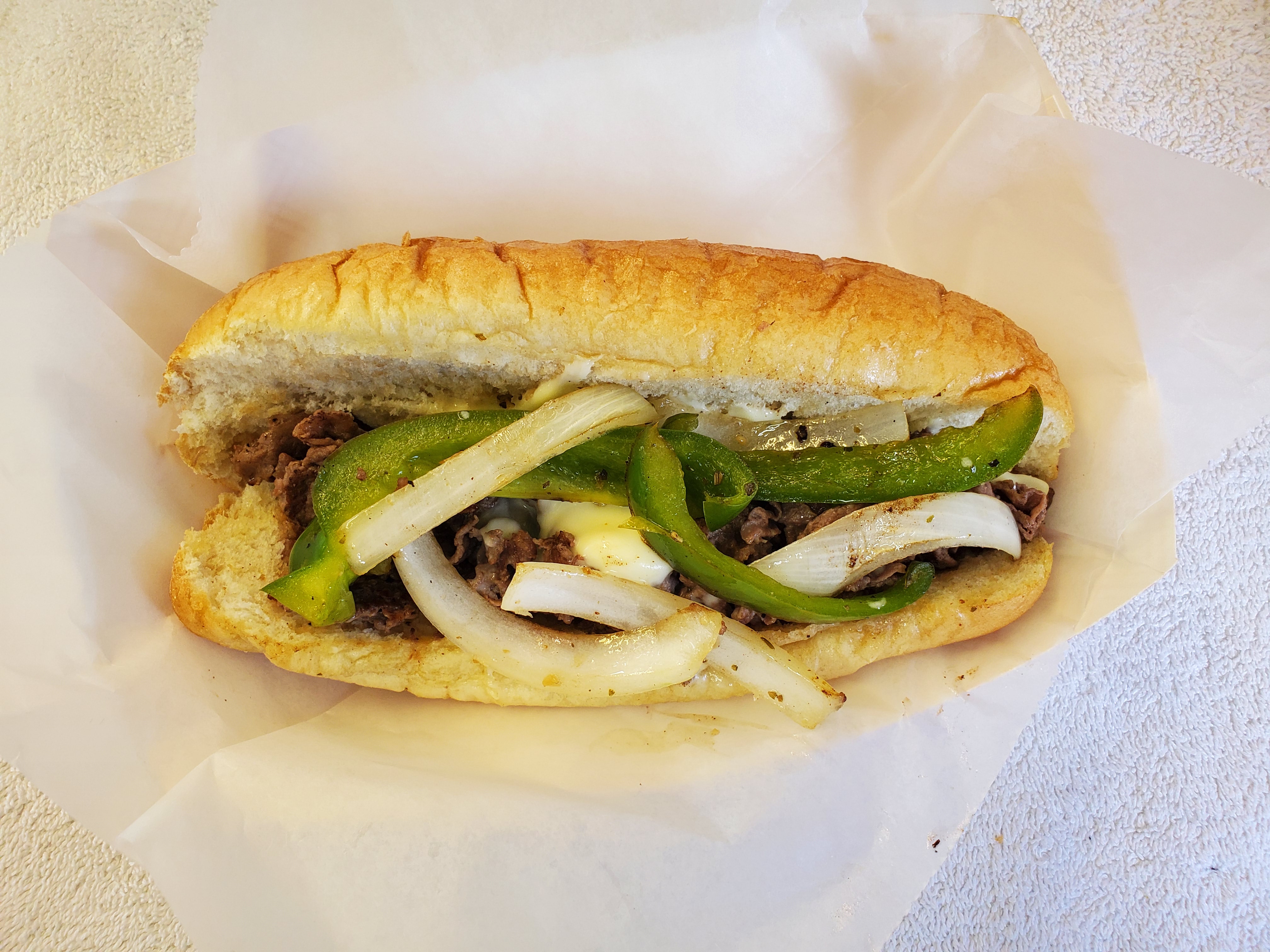 Order Steak and Cheese with Peppers and Onions food online from Shanes Hot Dogs store, Gardner on bringmethat.com