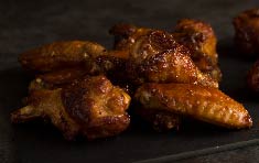 Order Oven-Baked Buffalo Wings food online from Flippers Pizzeria store, Saint Petersburg on bringmethat.com