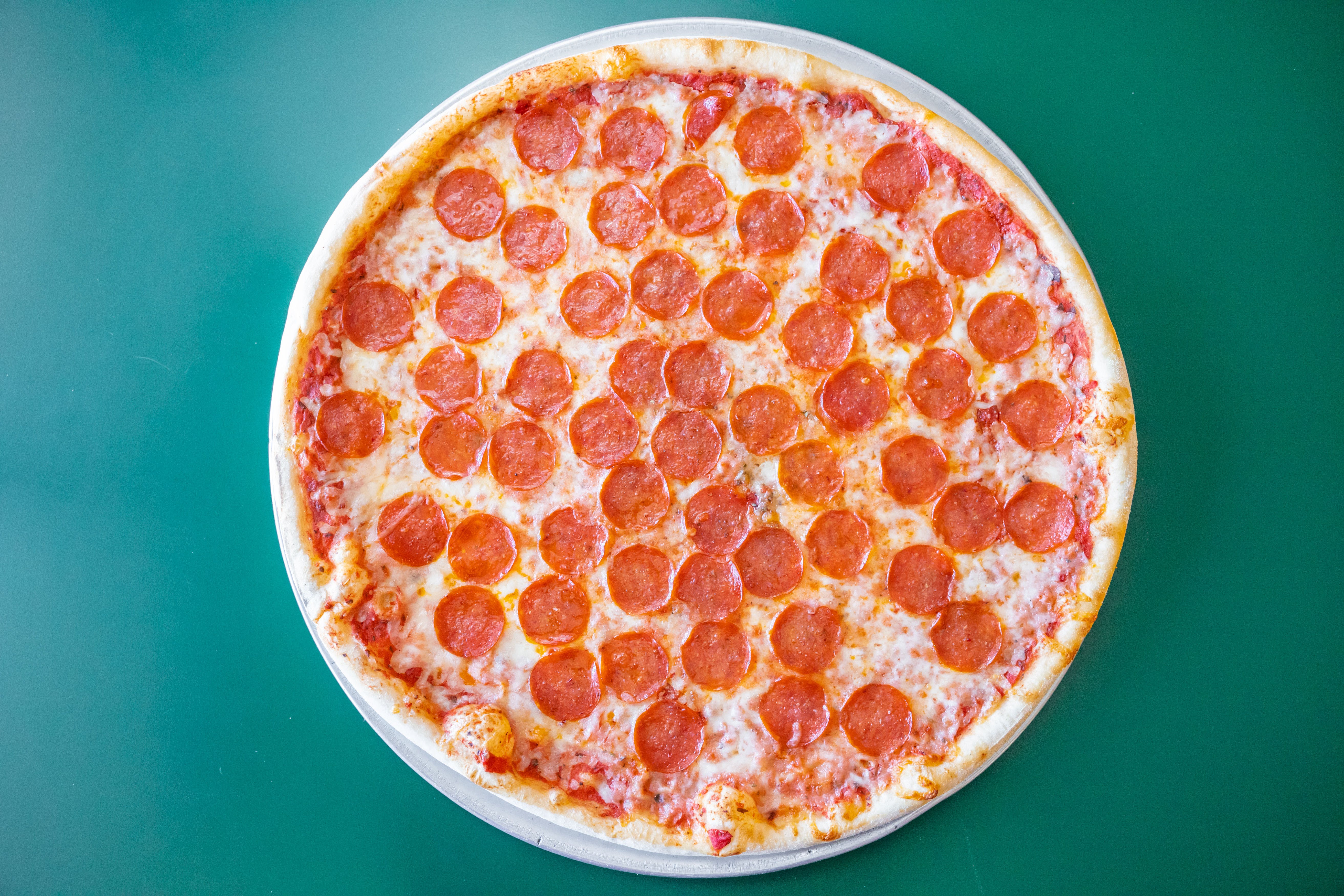 Order Personal Pepperoni Pizza - Personal 10" food online from Uncle Sal's Italian Villa store, Budd Lake on bringmethat.com