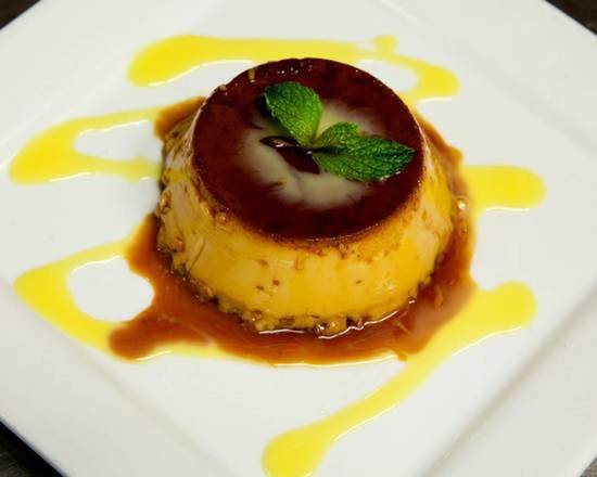 Order FLAN CON ROMPOPE / FLAN WITH MEXICAN ROMPOPE food online from La Casita Mexicana store, Bell on bringmethat.com