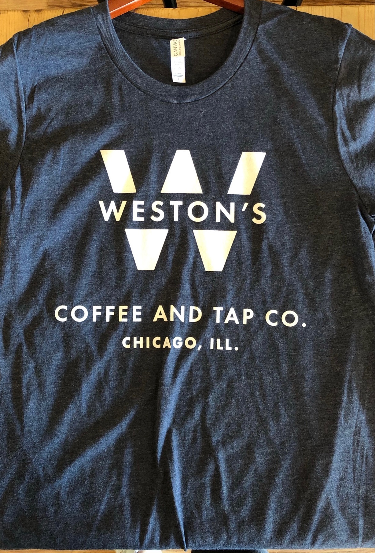 Order Navy Blue Heather T-shirt (Unisex) food online from Weston's Coffee & Tap Co. store, Chicago on bringmethat.com