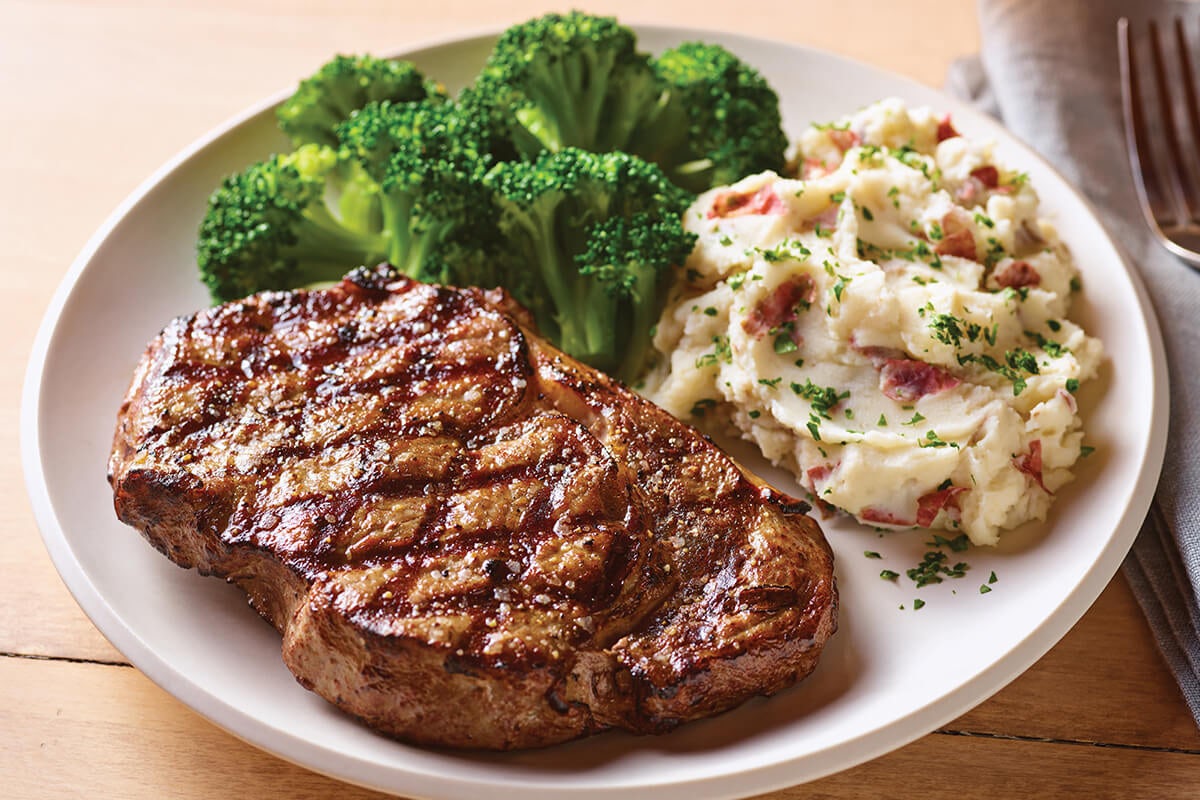 Order 12 oz. Ribeye* food online from Applebee's store, Monroe Township on bringmethat.com