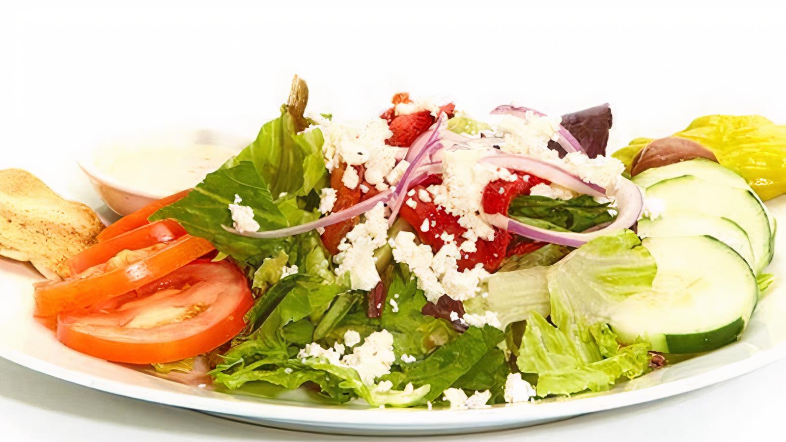 Order Greek Salad food online from Tazikis Mediterranean Cafe store, Denver on bringmethat.com