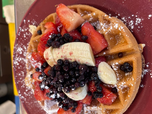 Order Belgian Chef Waffle with Fruit Topping Breakfast food online from Ricks Restaurant store, Palm Springs on bringmethat.com
