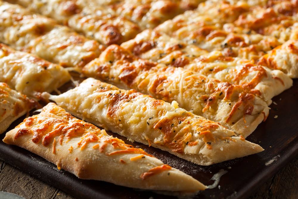 Order Cheese Bread food online from Guidos Pizza store, Anchorage on bringmethat.com