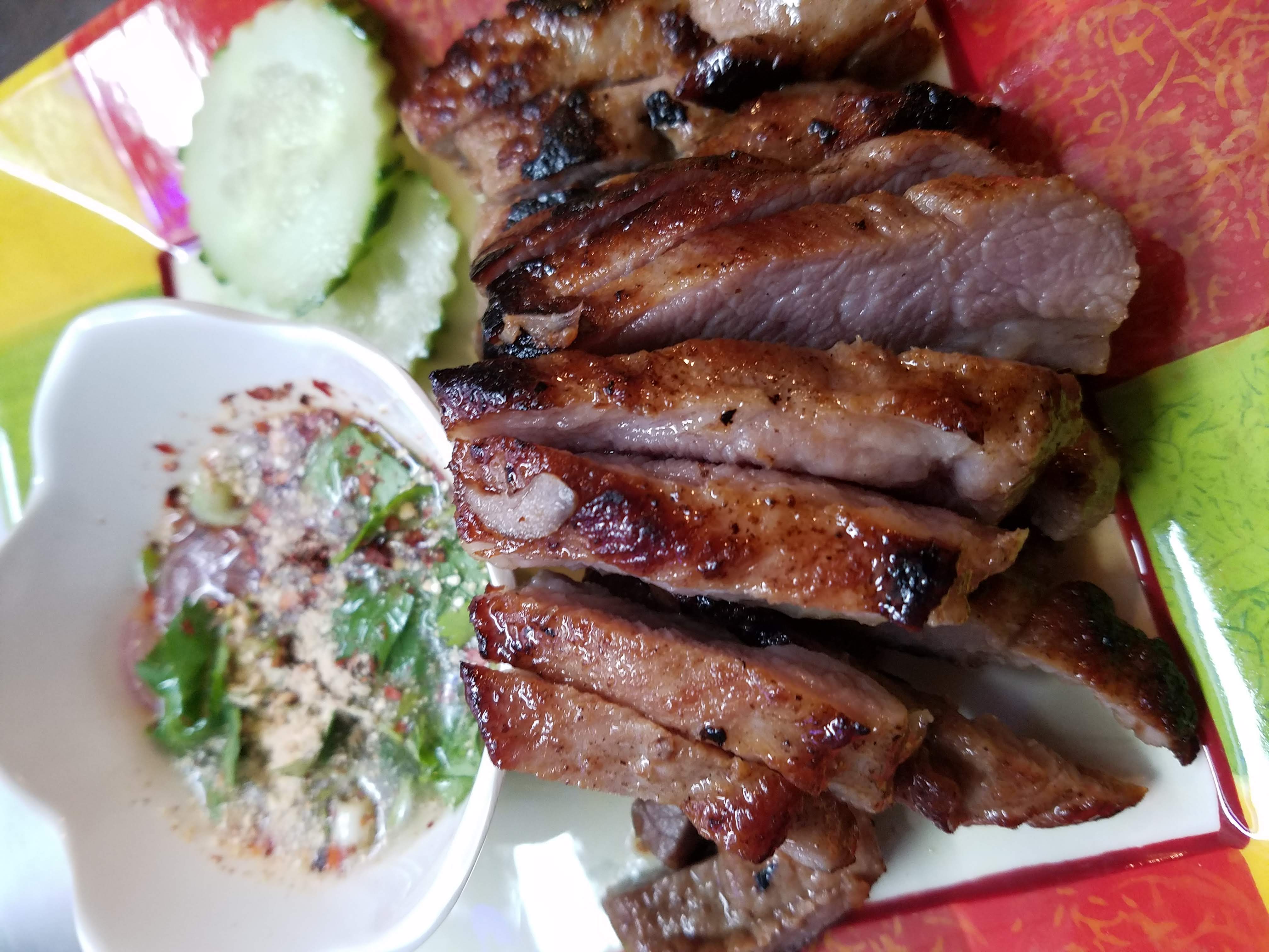 Order 8 oz. Grilled Pork Shoulder food online from Ghin Khao Eat Rice store, Chicago on bringmethat.com