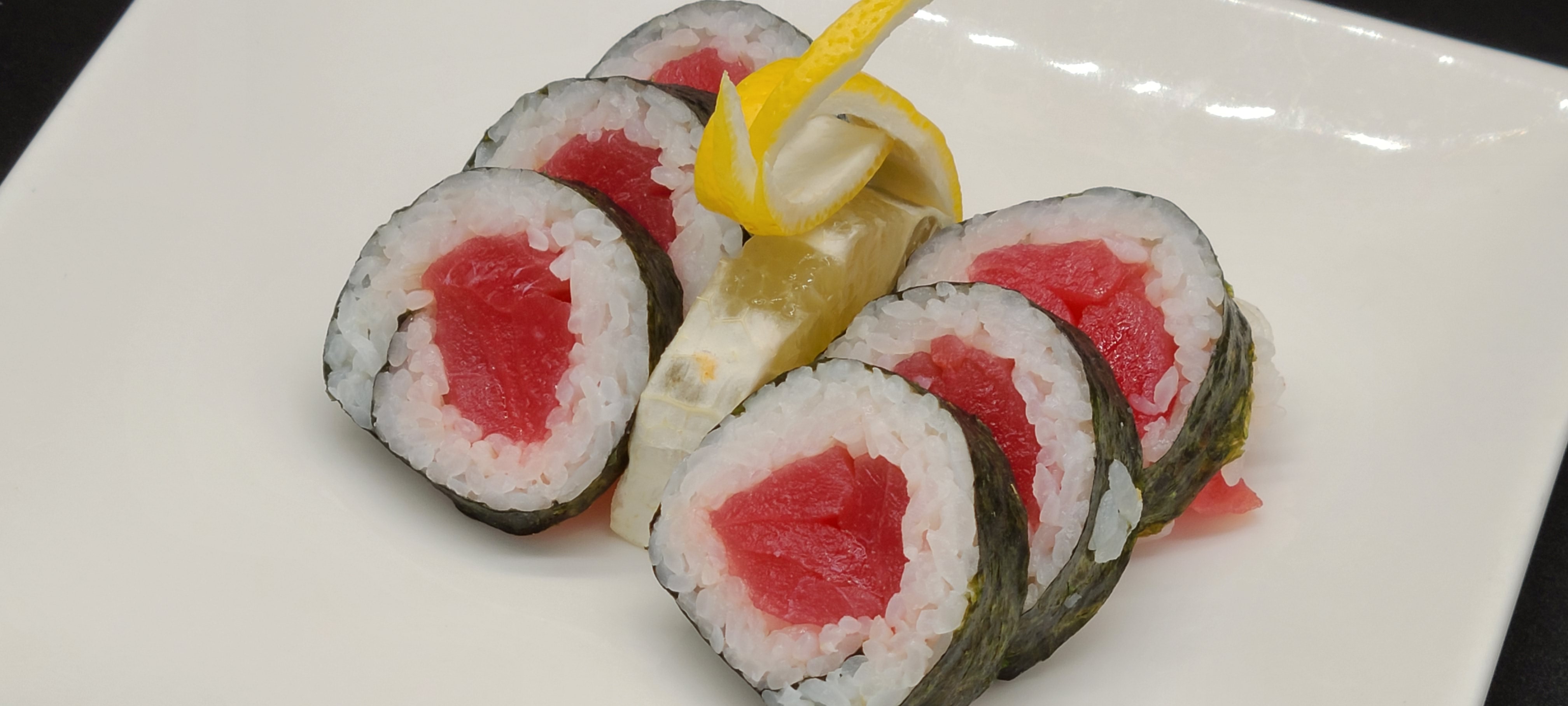 Order C12. Tuna Roll(5pcs) food online from Hello Sushi store, Fullerton on bringmethat.com