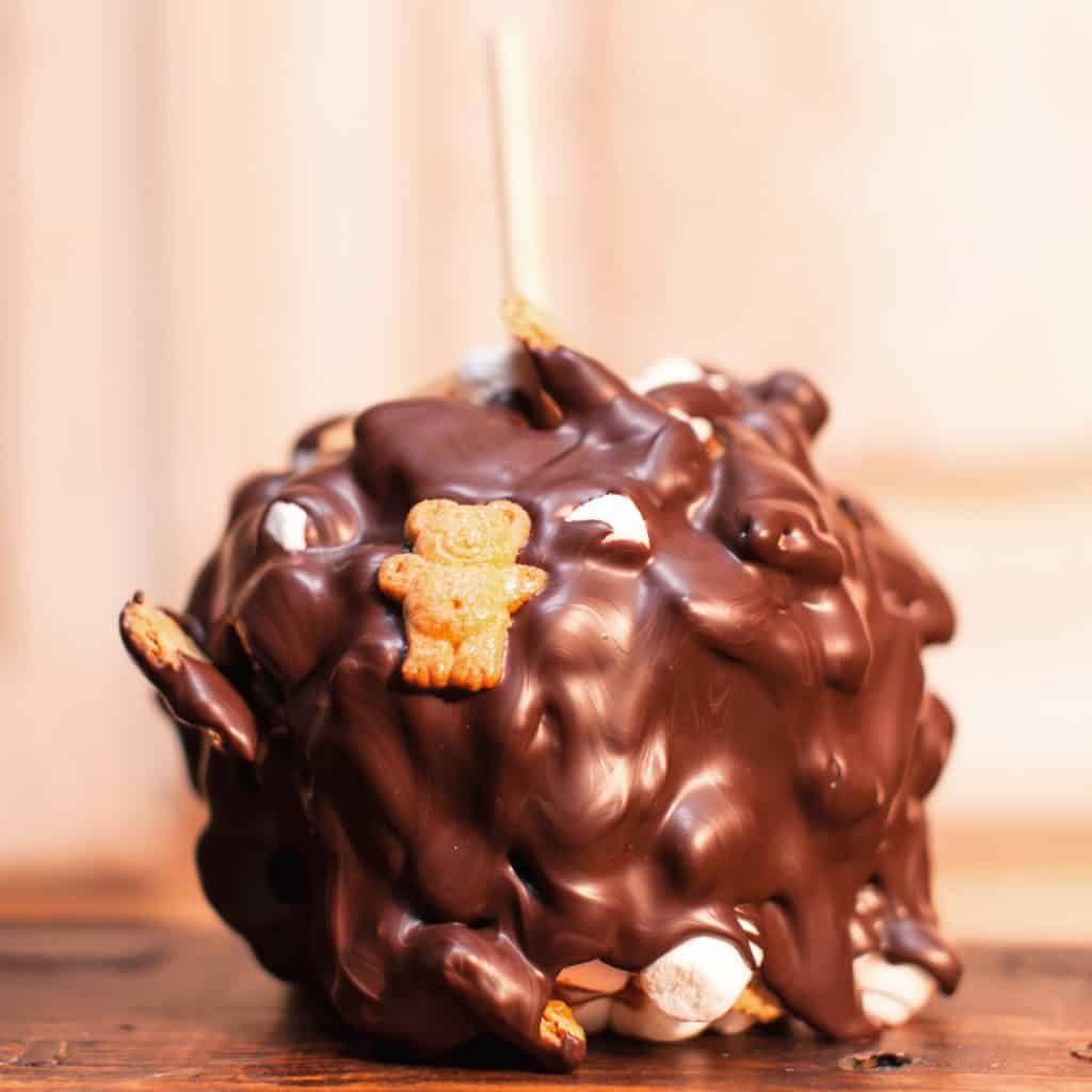 Order Dark Chocolate S’Mores Caramel Apple food online from Candy Apple Shoppe store, Glenwood on bringmethat.com