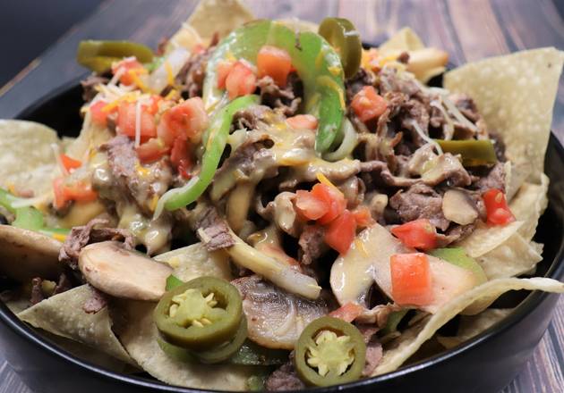 Order STEAK NACHO food online from Pepperjax Grill store, Council Bluffs on bringmethat.com