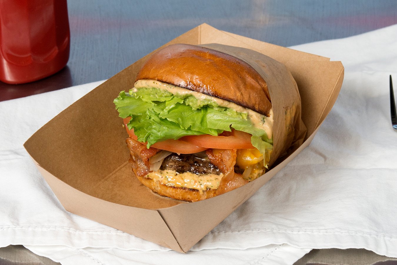 Order CALI BURGER food online from Burros & Fries store, National City on bringmethat.com
