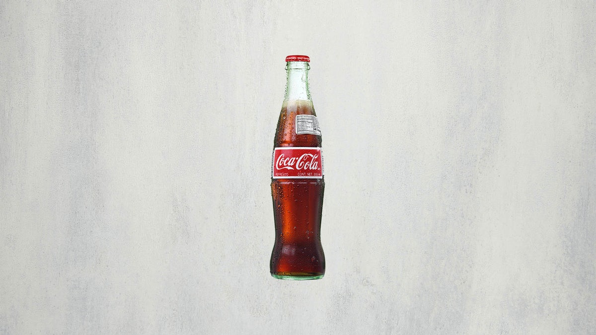 Order Mexican Coke (12 oz bottle) food online from Mod Pizza store, Ammon on bringmethat.com