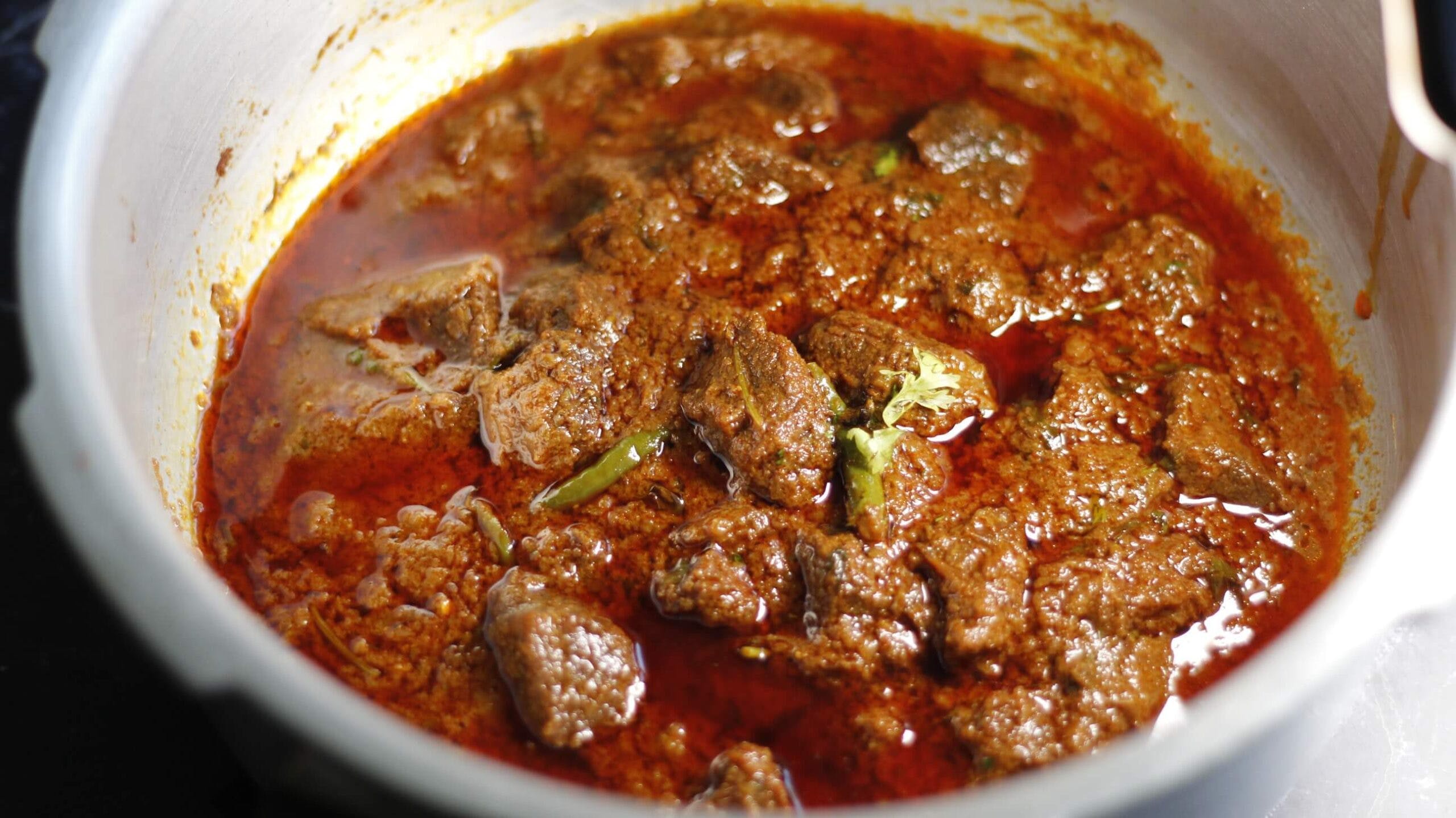 Order Indian Lamb Curry - With 2pc. Pita Bread food online from Best Pizza store, Atlanta on bringmethat.com
