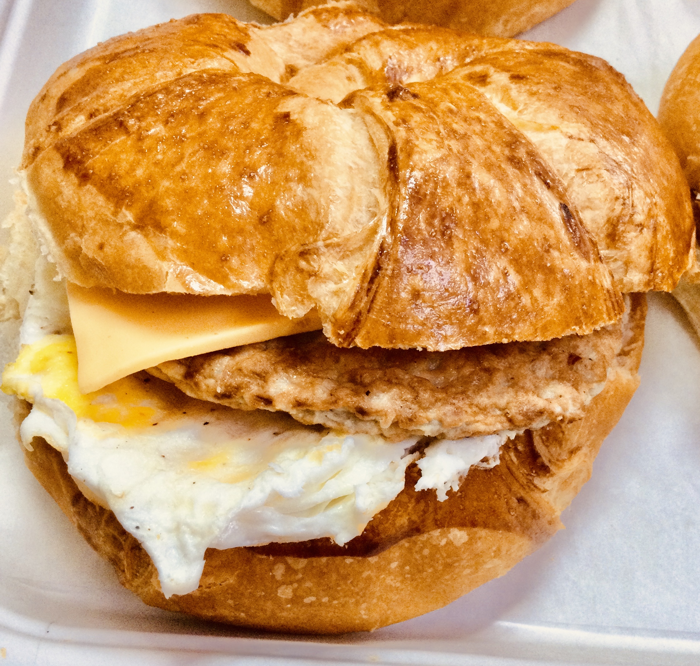 Order Croissant Sausage Egg and Cheese food online from Happy D Donuts store, Houston on bringmethat.com