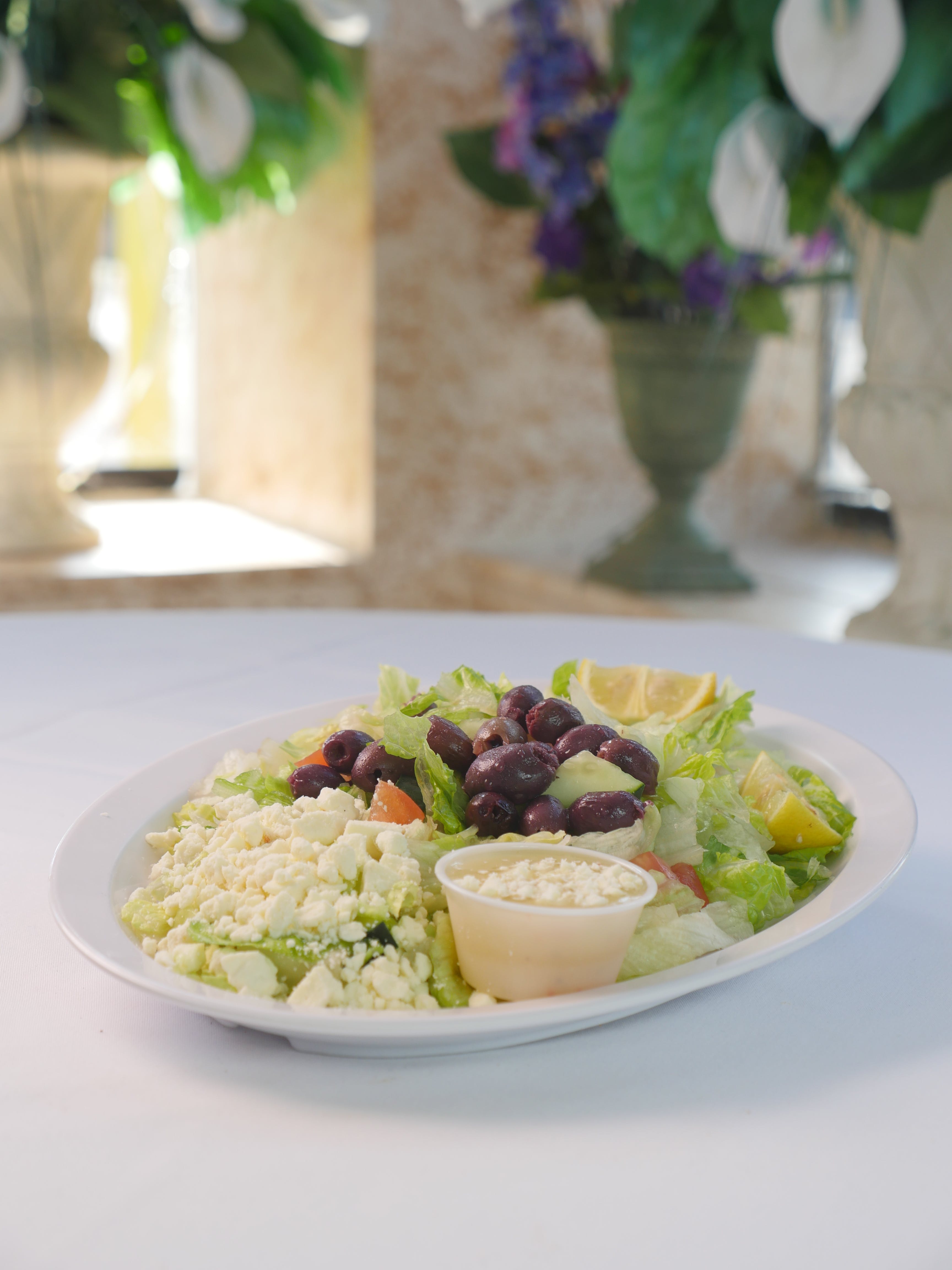 Order Greek Salad - Salad food online from Football Pizza store, Minneapolis on bringmethat.com