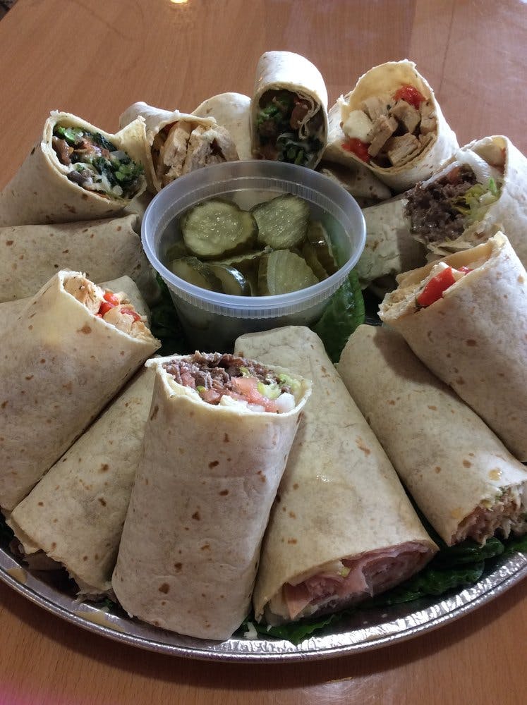 Order Breaded Chicken Caesar Wrap - Wrap food online from Spanky & Louches Pizzeria Restaurant store, Norristown on bringmethat.com