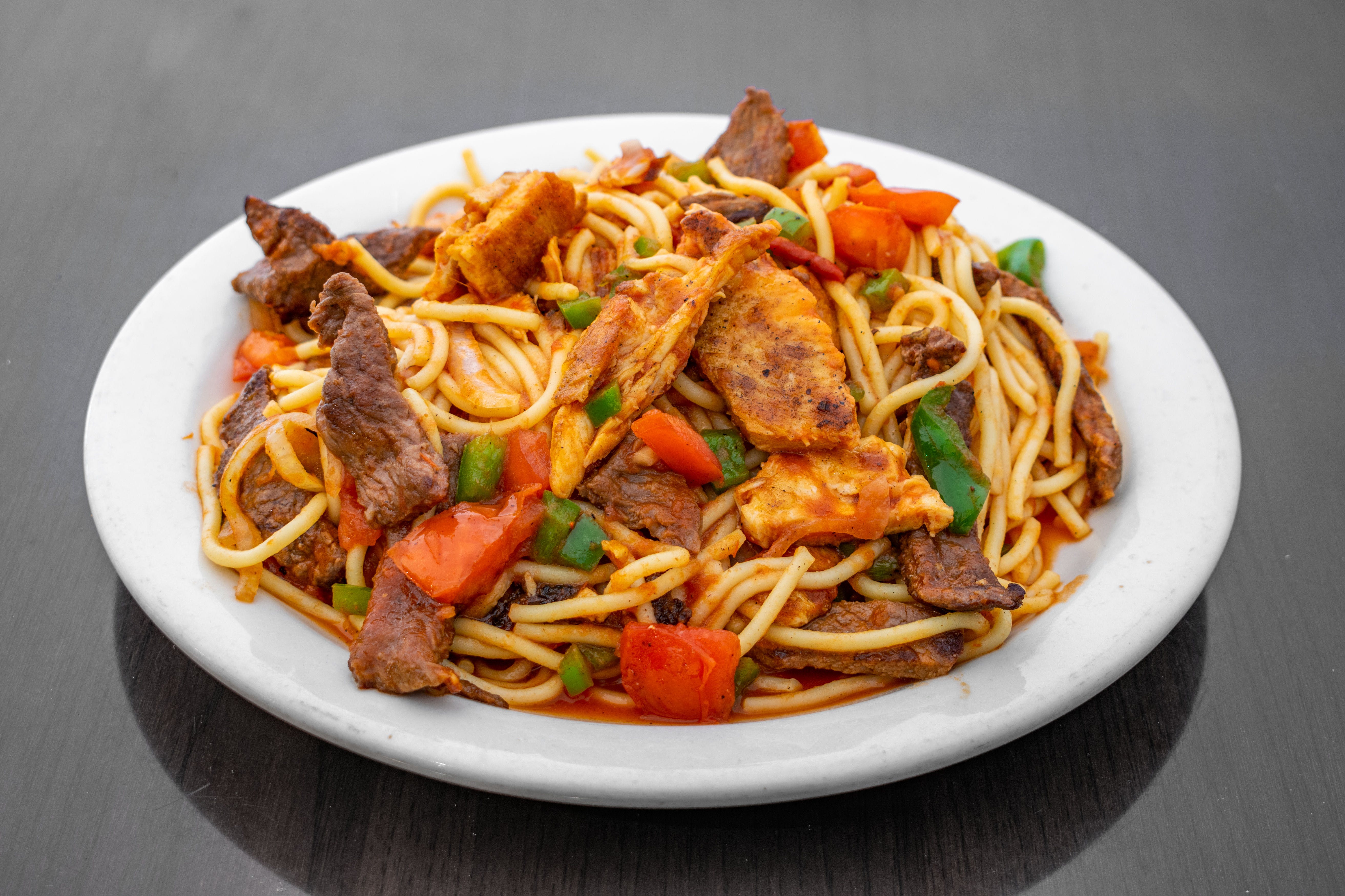 Order 10. Mixed Spaghetti Platter - Platters food online from Mega Pizza and Lunchonette store, Newark on bringmethat.com
