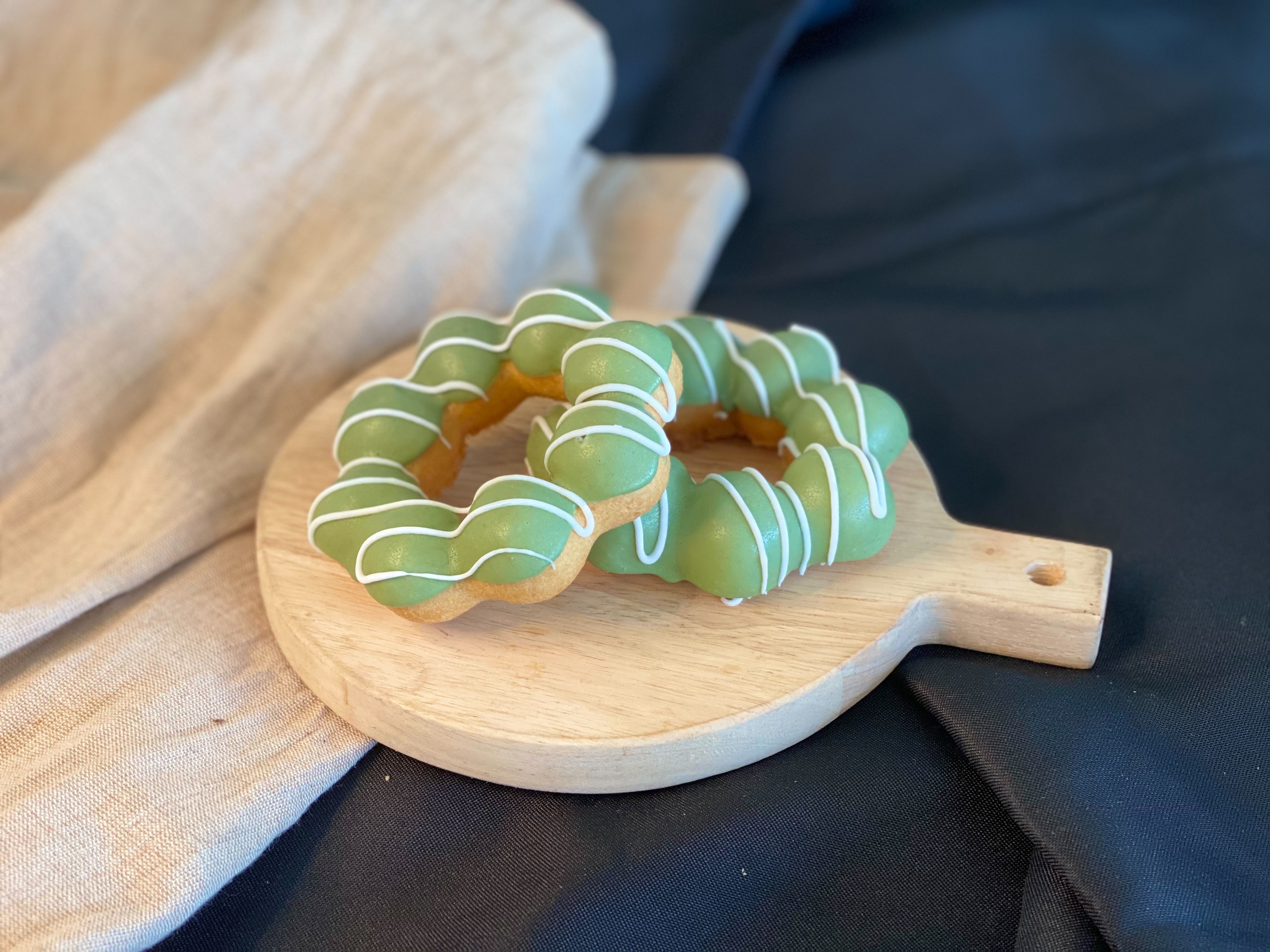 Order Matcha White Chocolate Mochi Donut food online from Sunmerry Bakery store, Gardena on bringmethat.com
