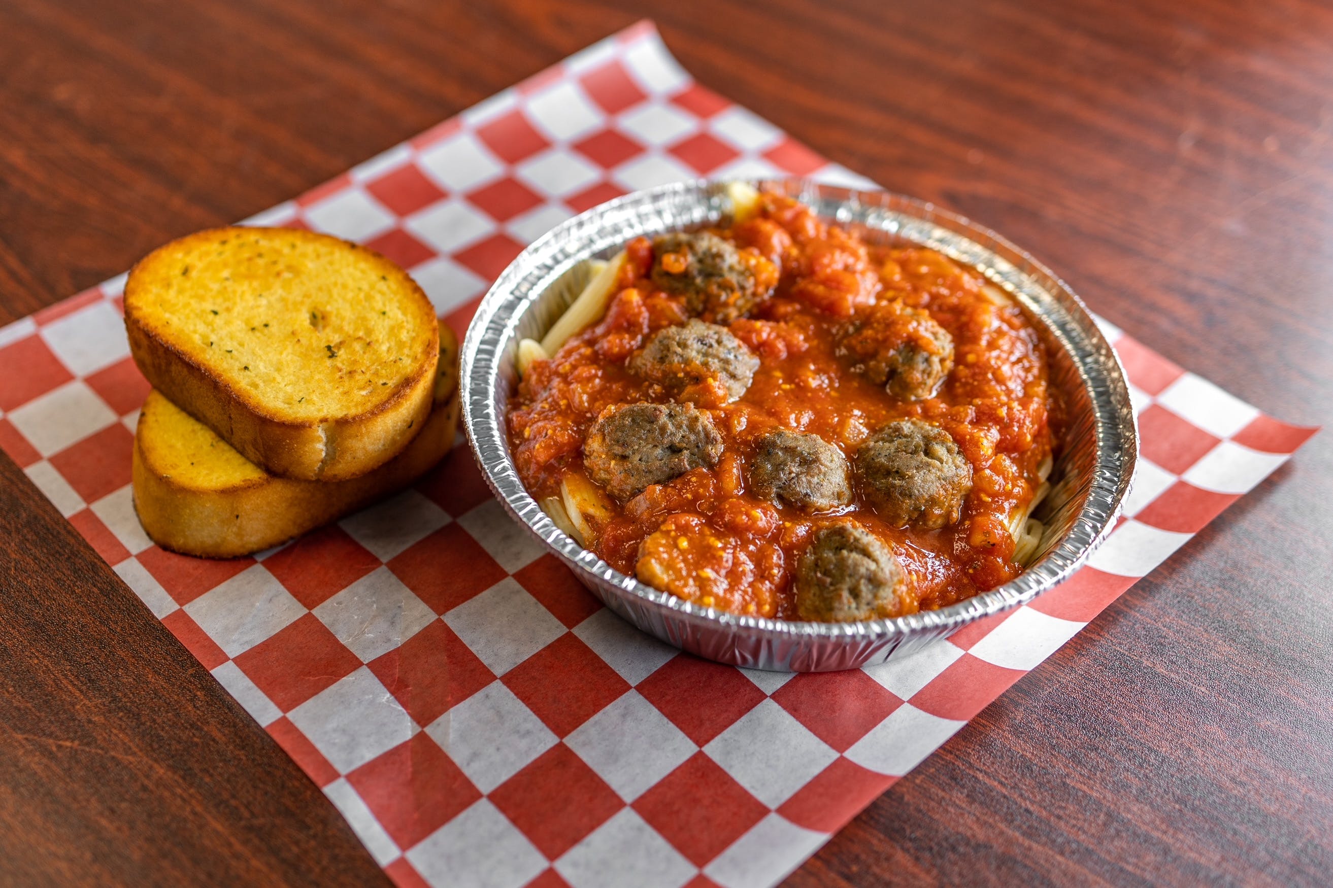 Order Italian Pasta with Meatballs - Pasta food online from Jimmy's Pizza Litchfield store, Litchfield on bringmethat.com