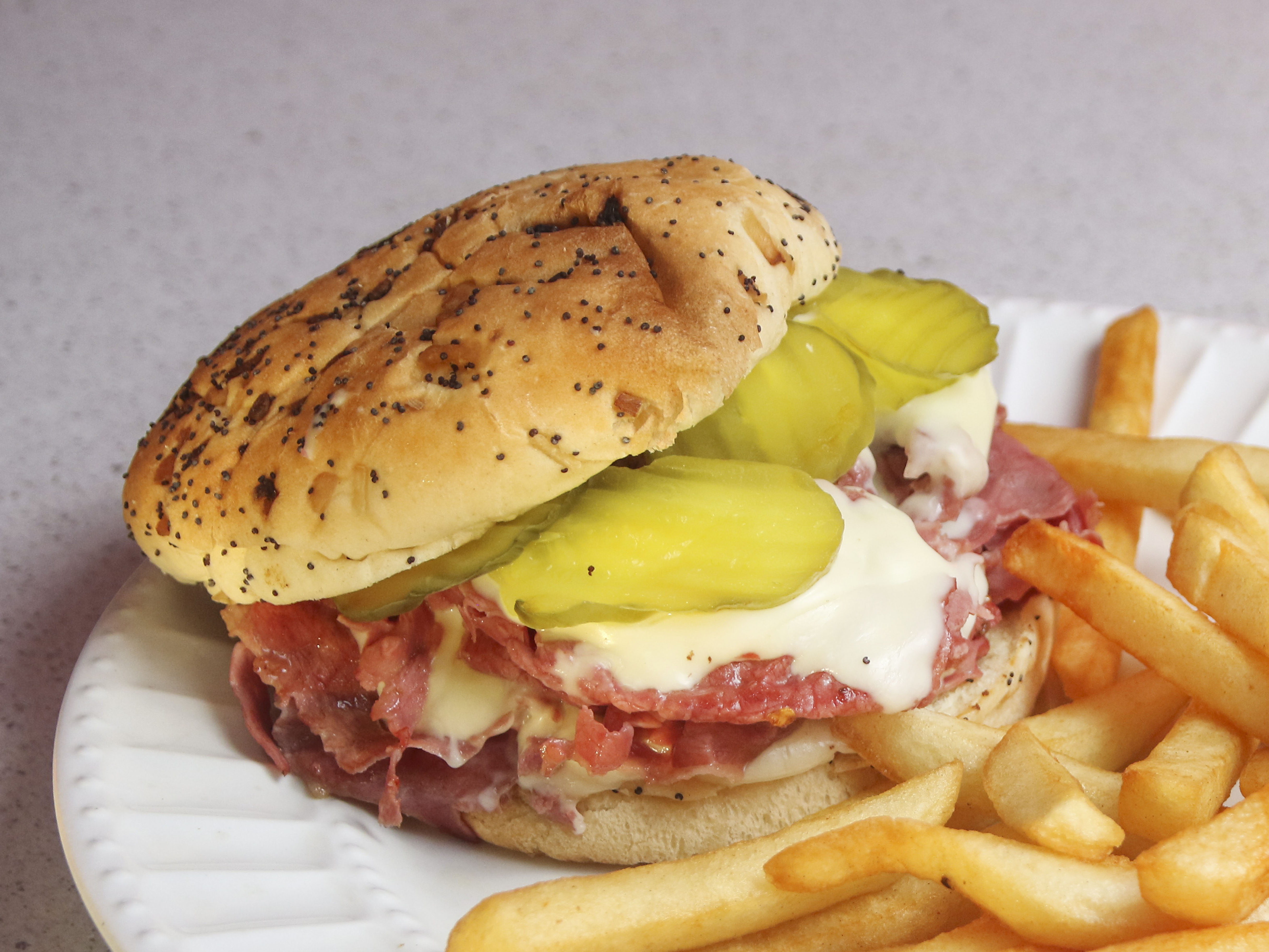 Order Giant Corned Beef Sandwich food online from Papa's Pizza & BBQ store, Clinton Twp on bringmethat.com