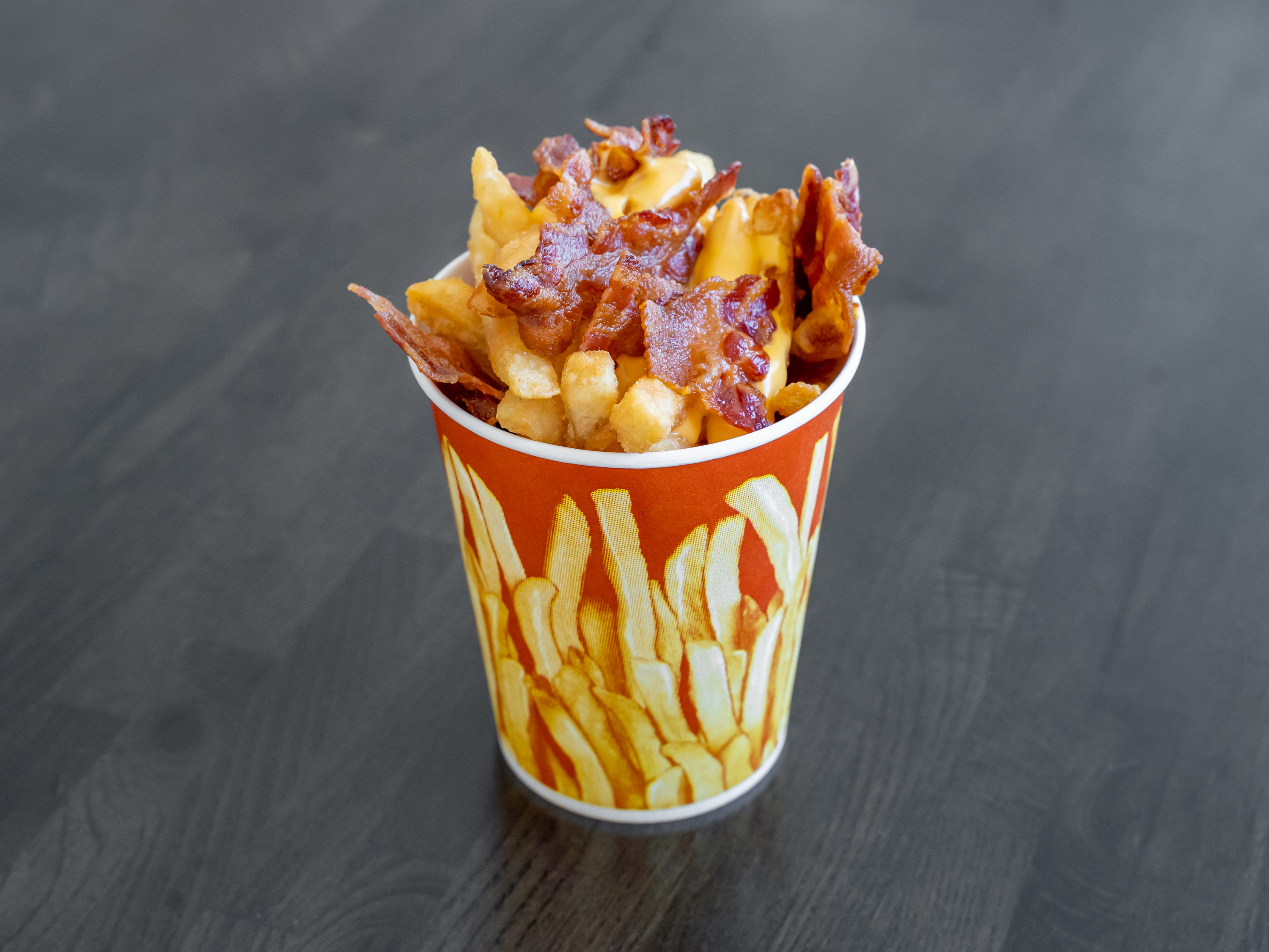 Order Bacon Cheese Fries food online from Munchies Dessert Shoppe store, Philadelphia on bringmethat.com