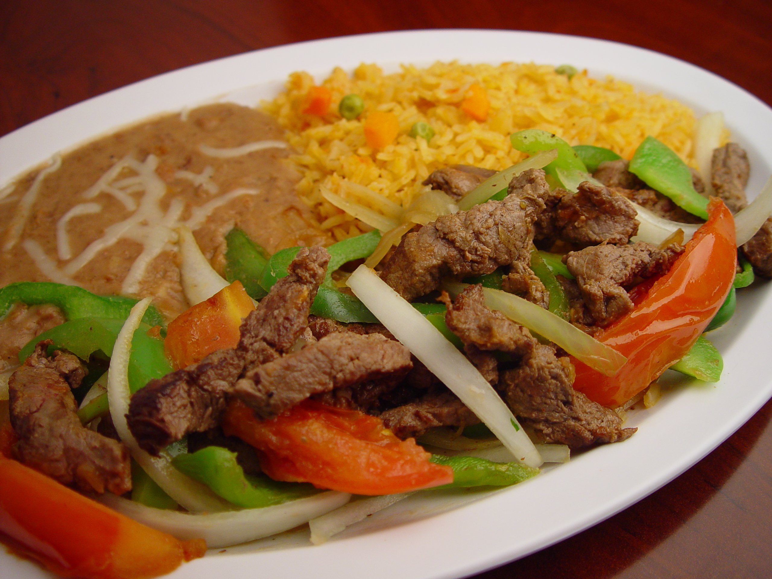 Order 57. Steak Fajitas food online from Rodeo Mexican Grill store, Los Angeles on bringmethat.com