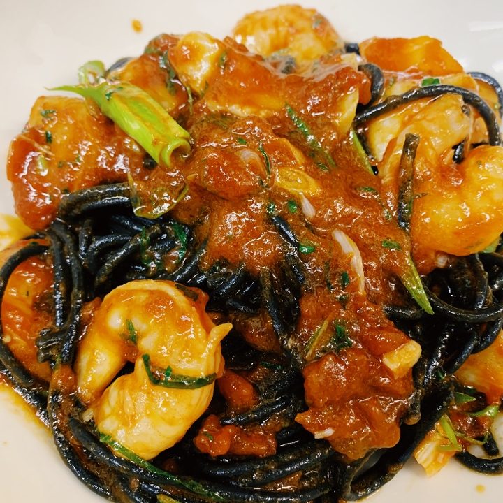 Order Black Spaghetti with Spicy Frutti Di Mare food online from Lupa Osteria Romana store, New York on bringmethat.com