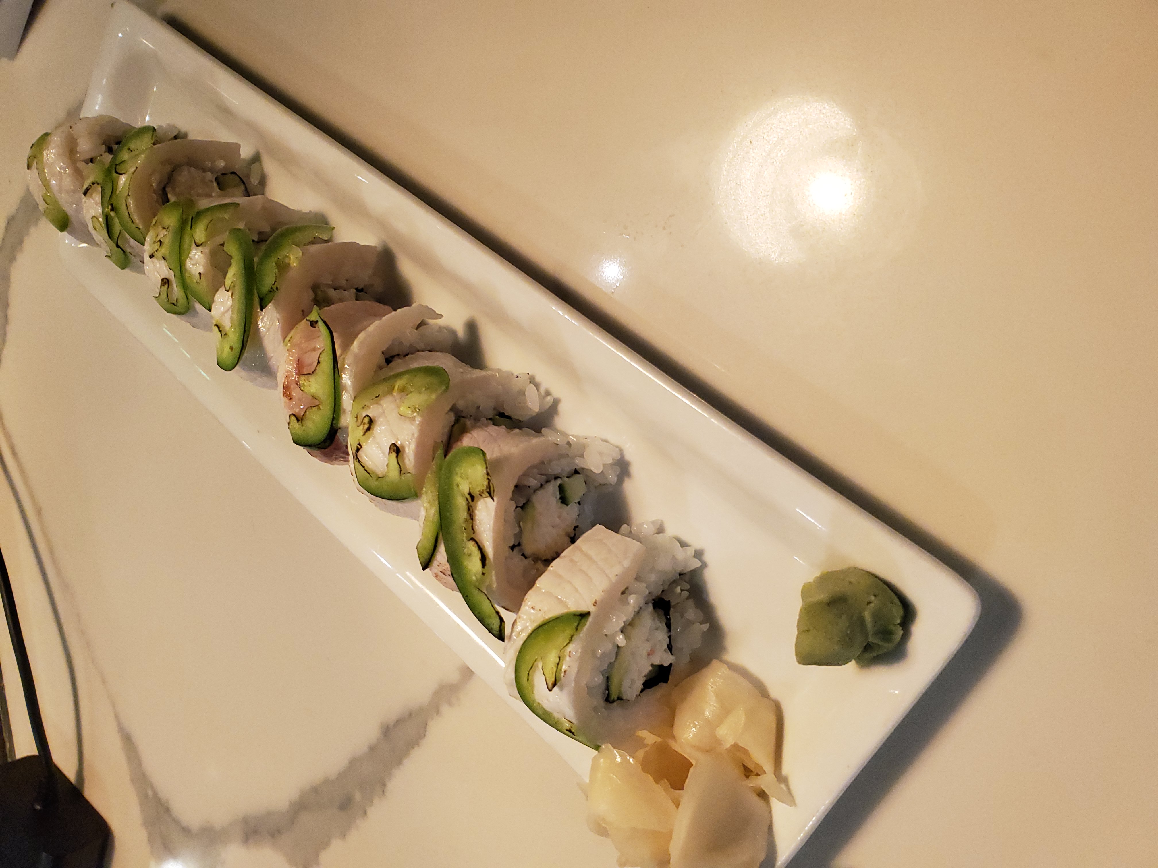 Order Seared Yellowtail Jalapeño Roll food online from Ten Asian Bistro store, Newport Beach on bringmethat.com