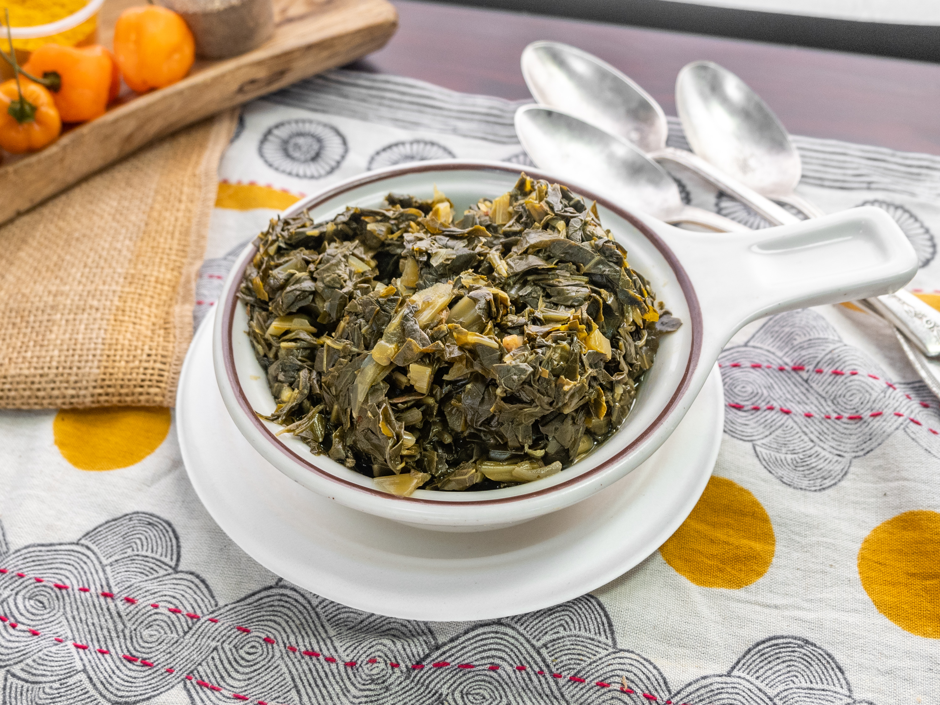 Order 23. Collard Greens food online from A&H African & Jamaican Restaurant store, Clementon on bringmethat.com