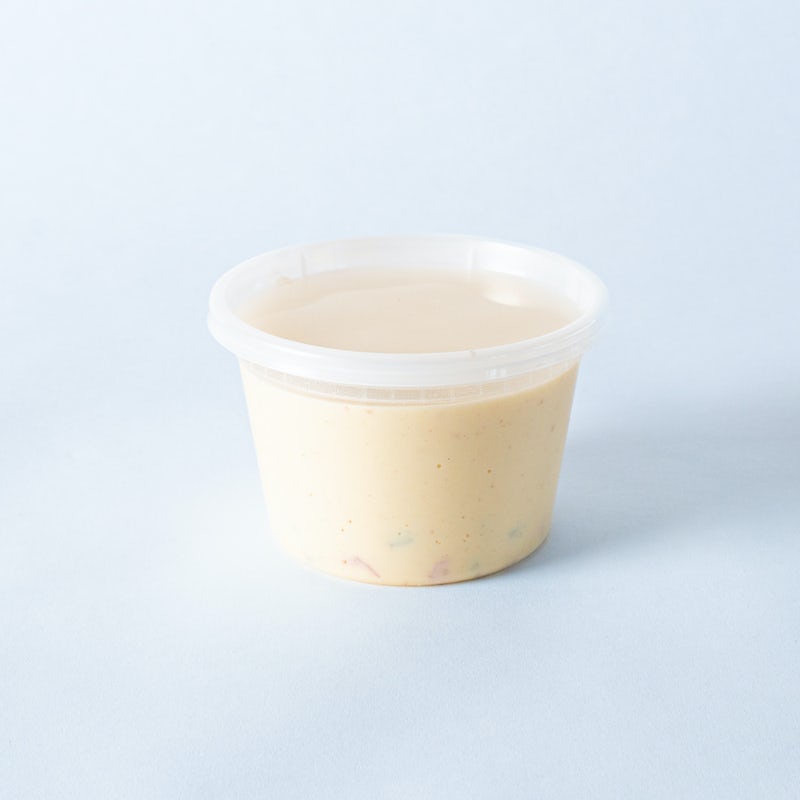 Order Pint of Queso food online from Gusto! store, Decatur on bringmethat.com