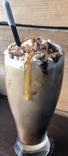 Order Large Milky Way iced latte food online from Doughnuts & Draughts store, Worcester on bringmethat.com