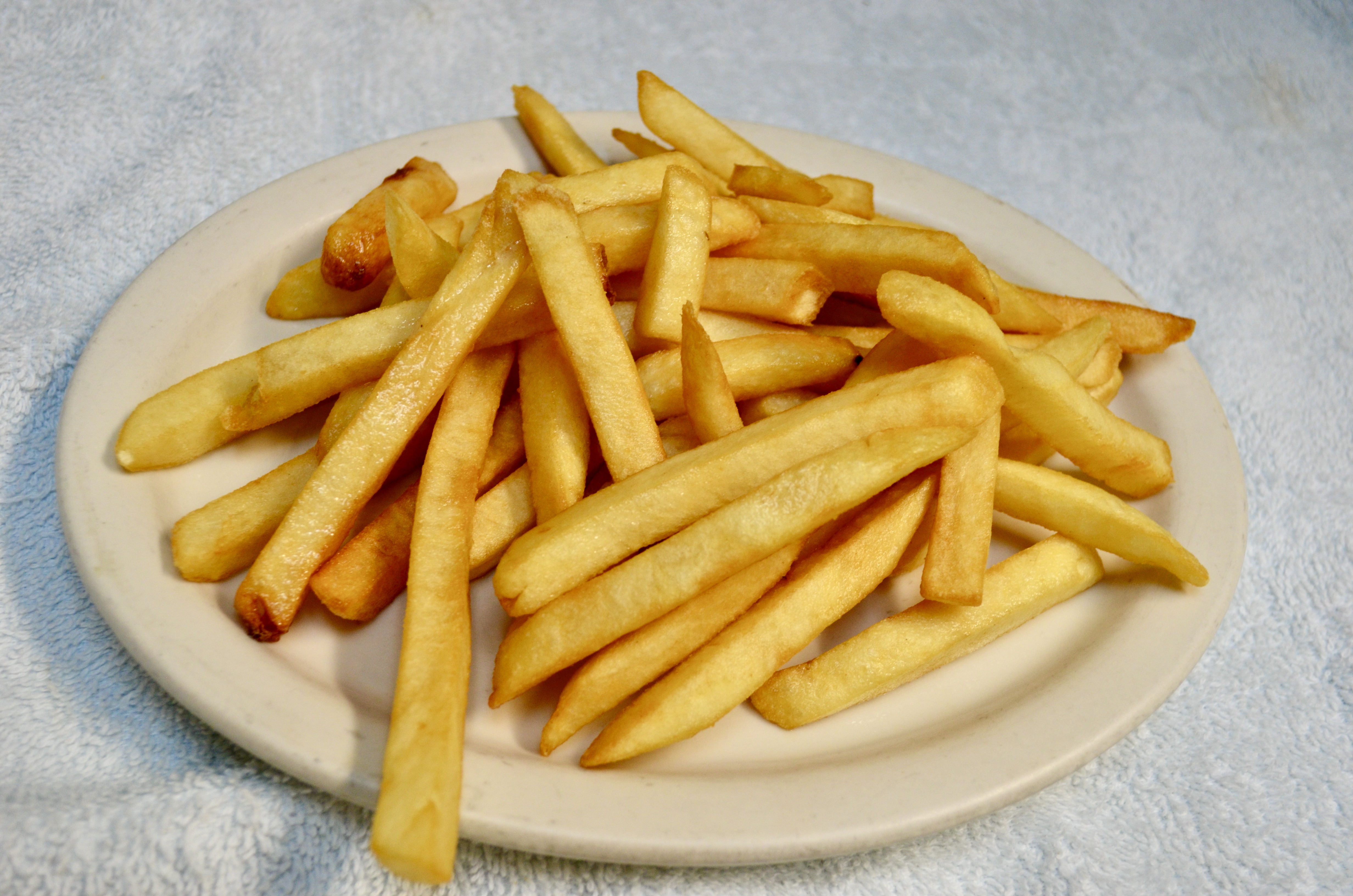 Order French Fries food online from El Amigo store, Golden on bringmethat.com