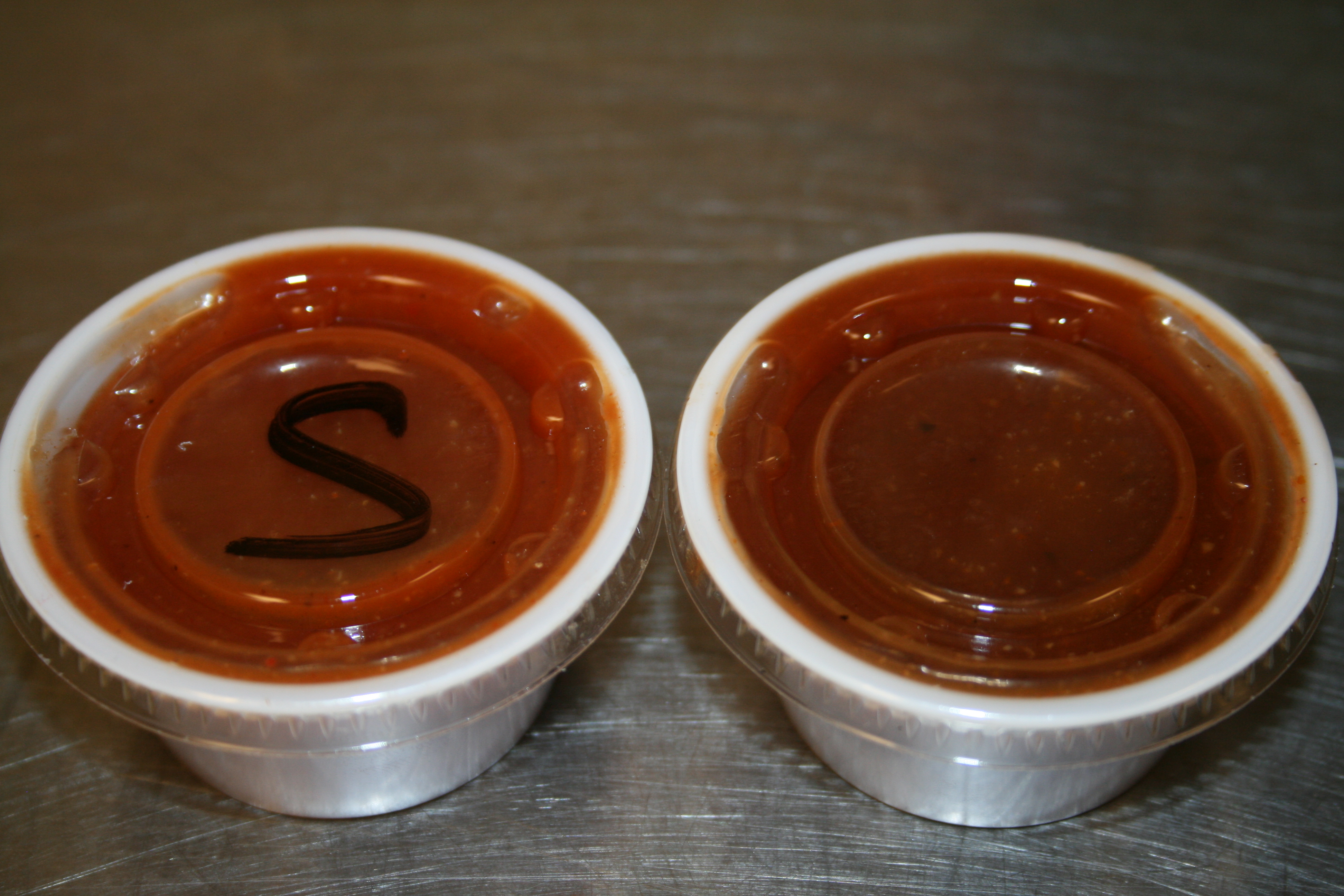 Order Extra BBQ Sauce food online from Chasin' Tail Bbq store, Lake Dallas on bringmethat.com