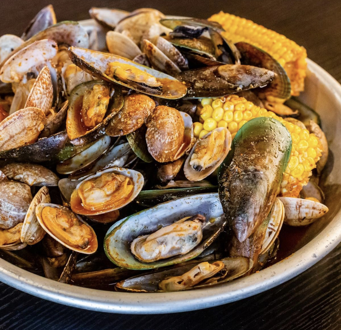 Order (E)1 lb. Baby Clams  & 1 lb. Mussels food online from Shakin Crab store, Manassas on bringmethat.com