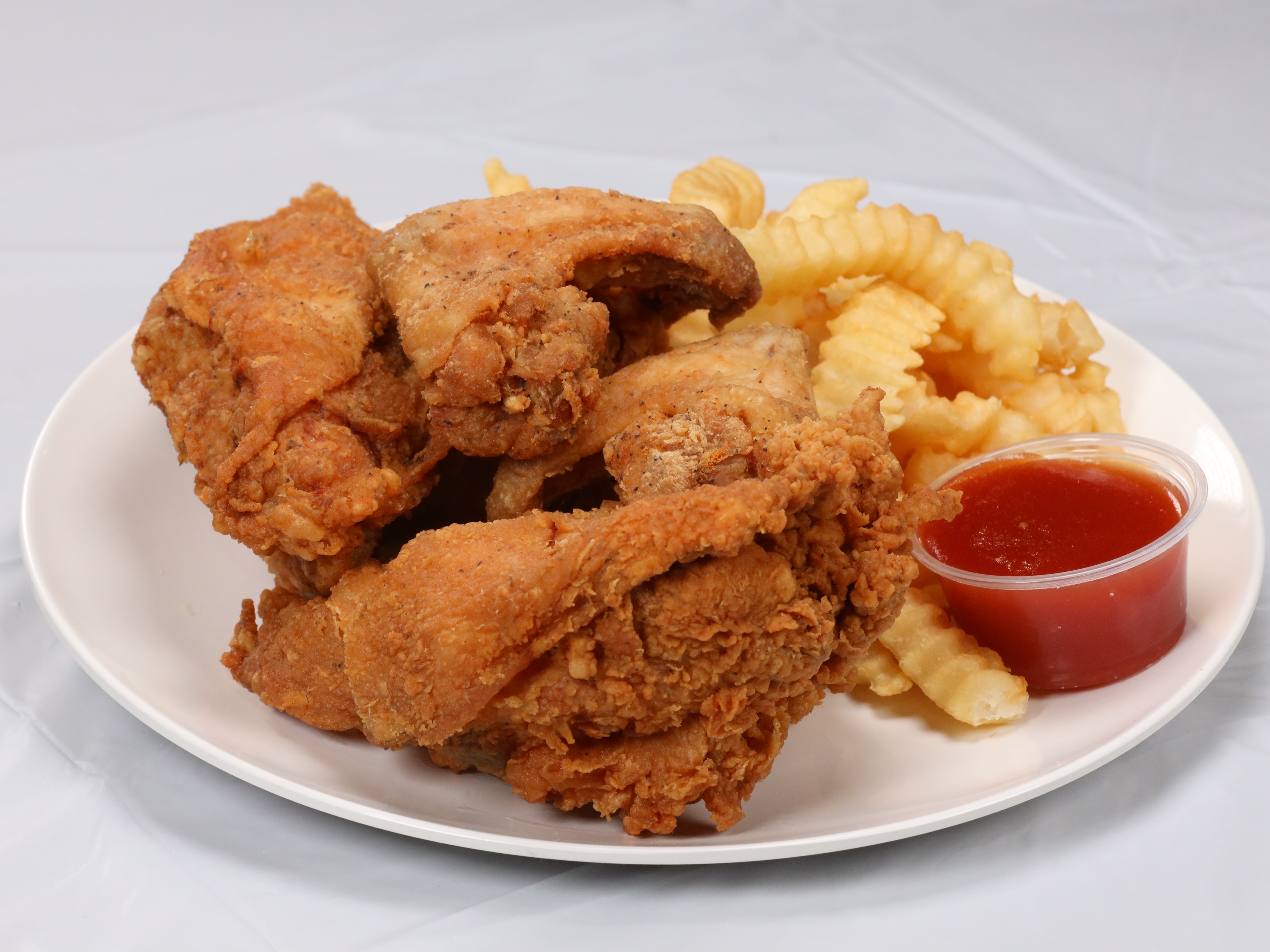 Order Half  Mixed food online from Sam Sylks Chicken & Fish store, South Euclid on bringmethat.com