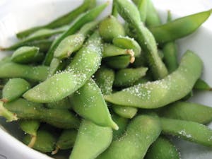 Order 5. Edamame food online from Asian Pot Express store, Lewisville on bringmethat.com