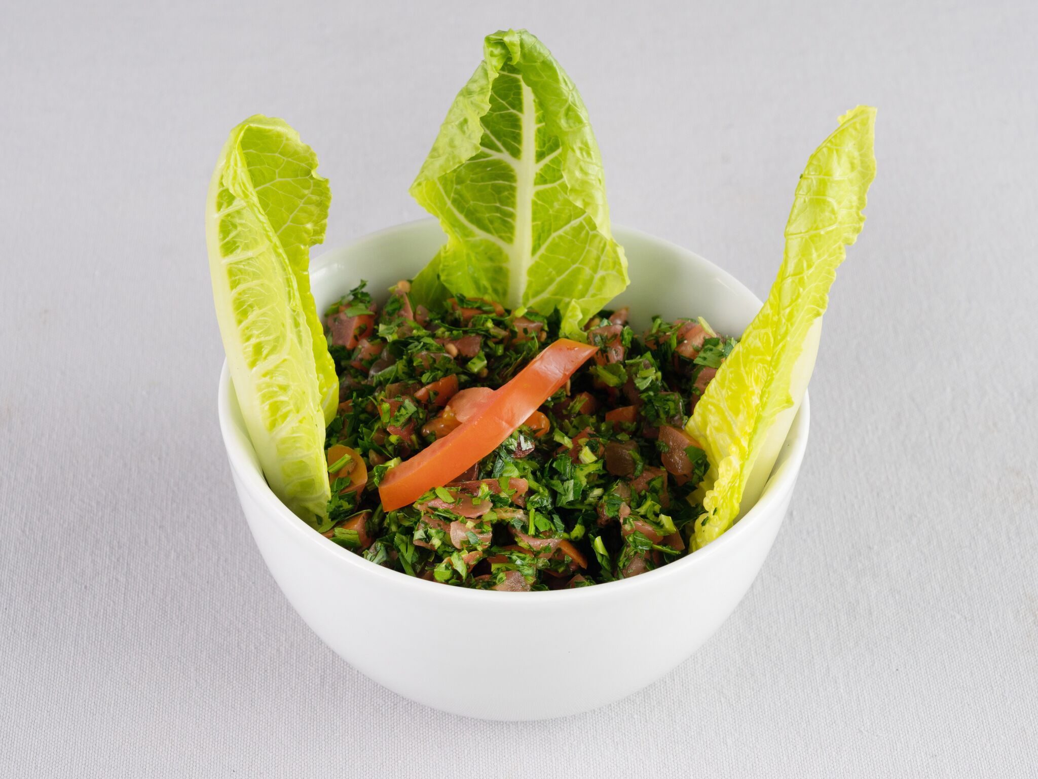 Order Tabbouli Salad food online from Rest House Cafe store, Houston on bringmethat.com