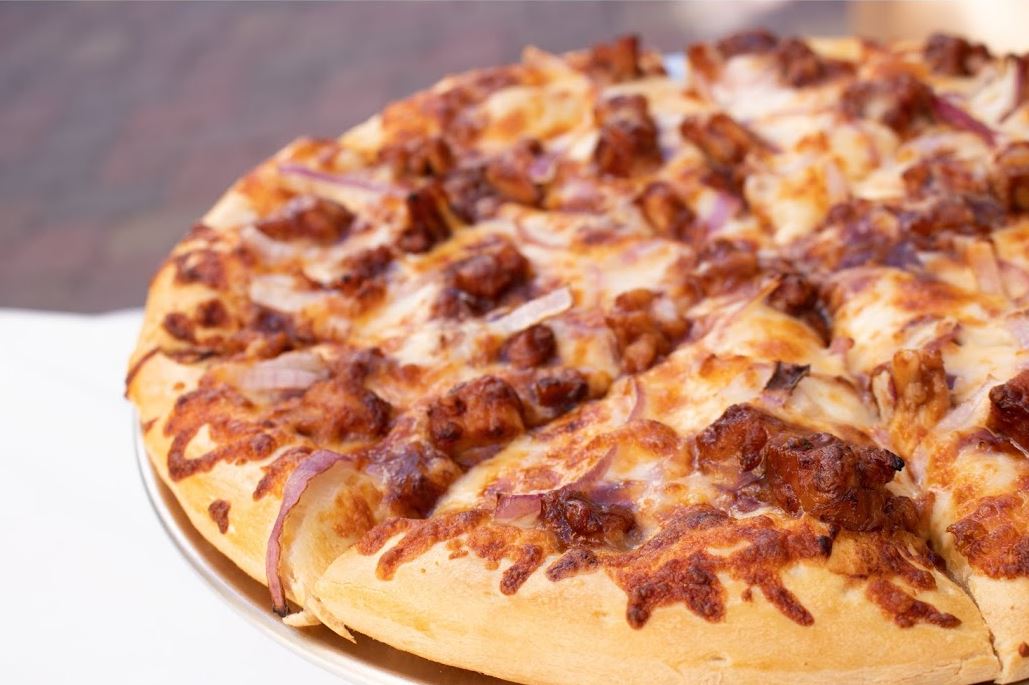 Order BBQ Chicken Specialty Pizza food online from 4 Eggs & Pizza store, Santa Barbara on bringmethat.com