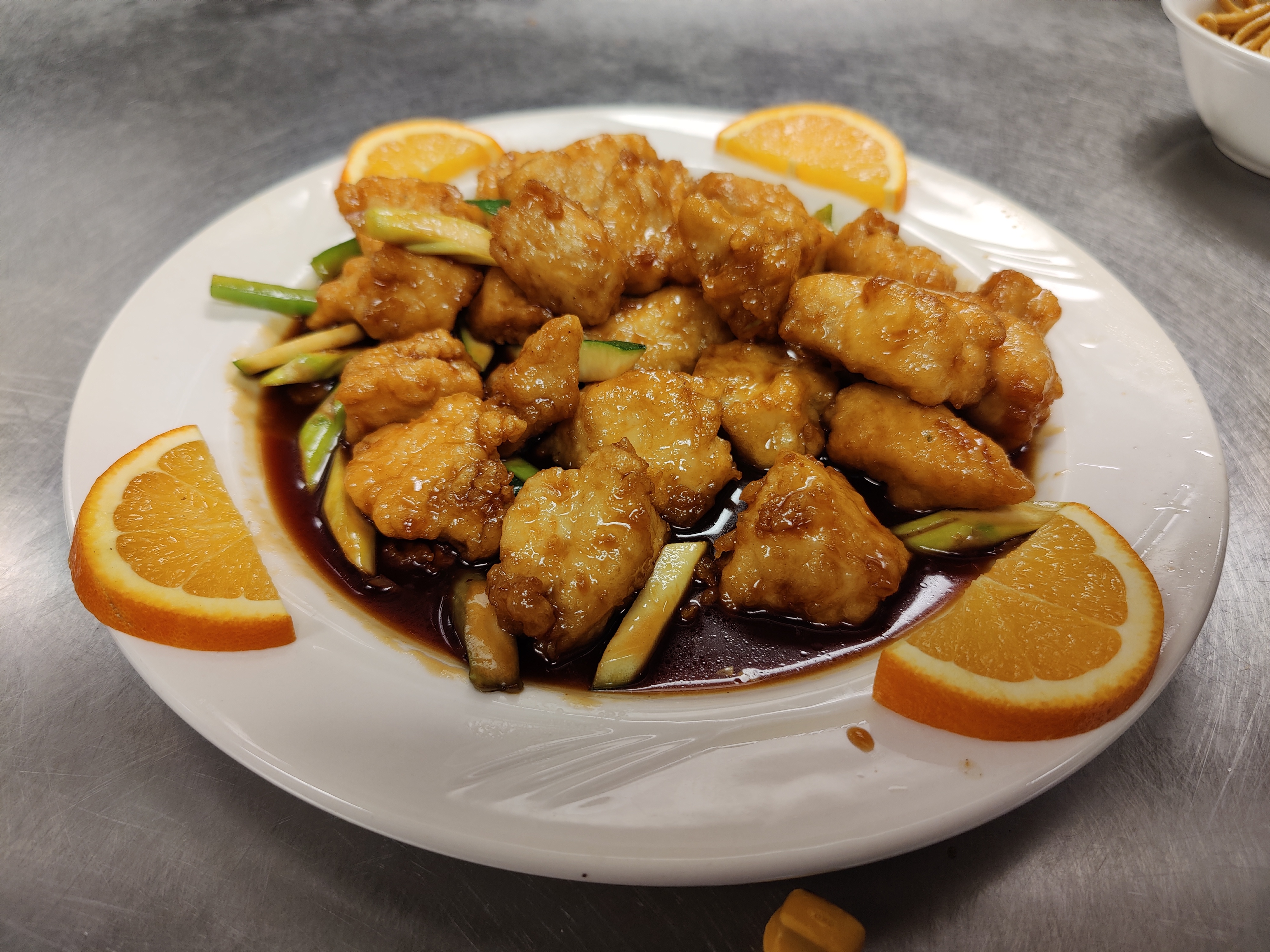 Order Orange Chicken food online from Ming Asian Cuisine store, Johnson City on bringmethat.com