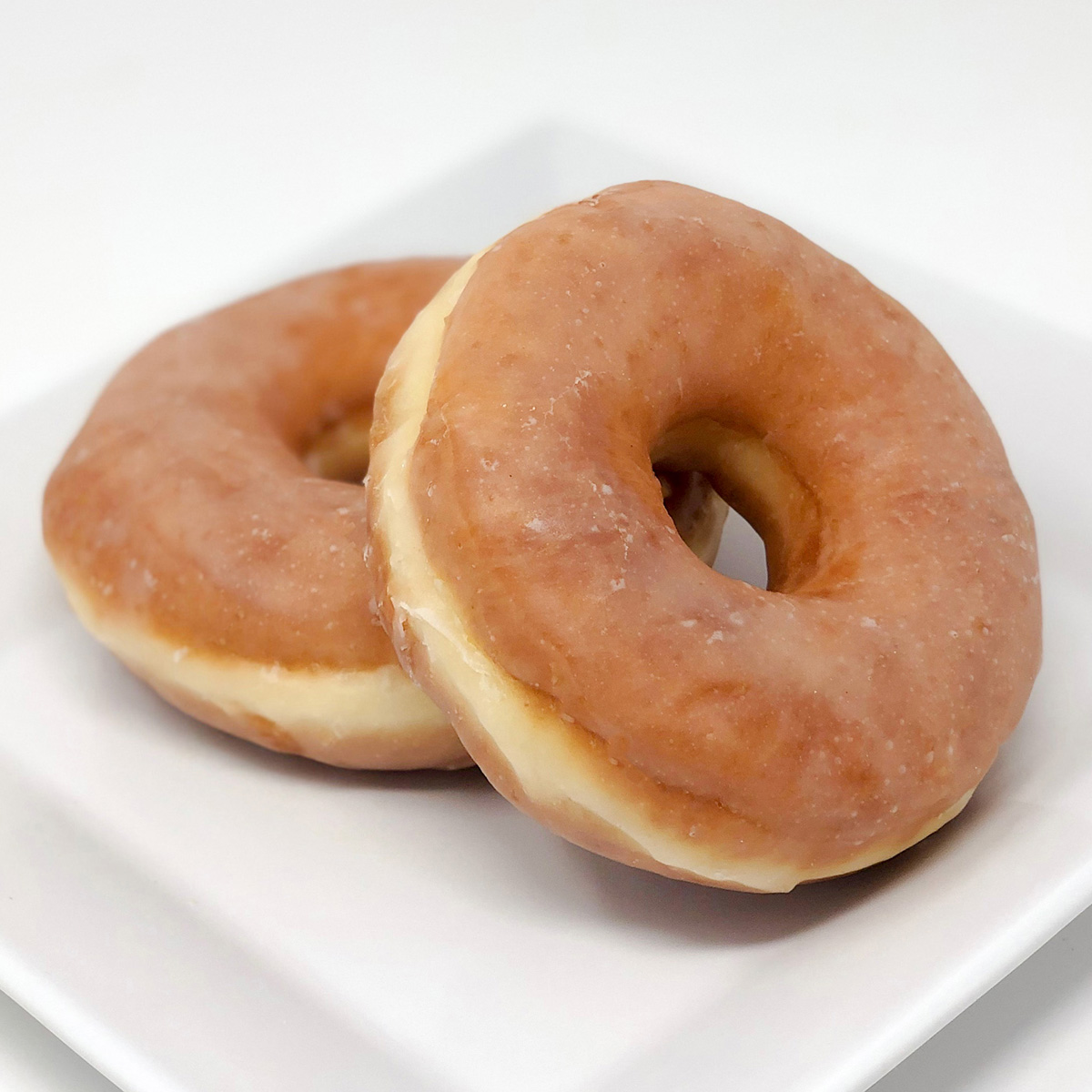 Order Glazed Raised Donut food online from Merritt Bakery store, Tulsa on bringmethat.com