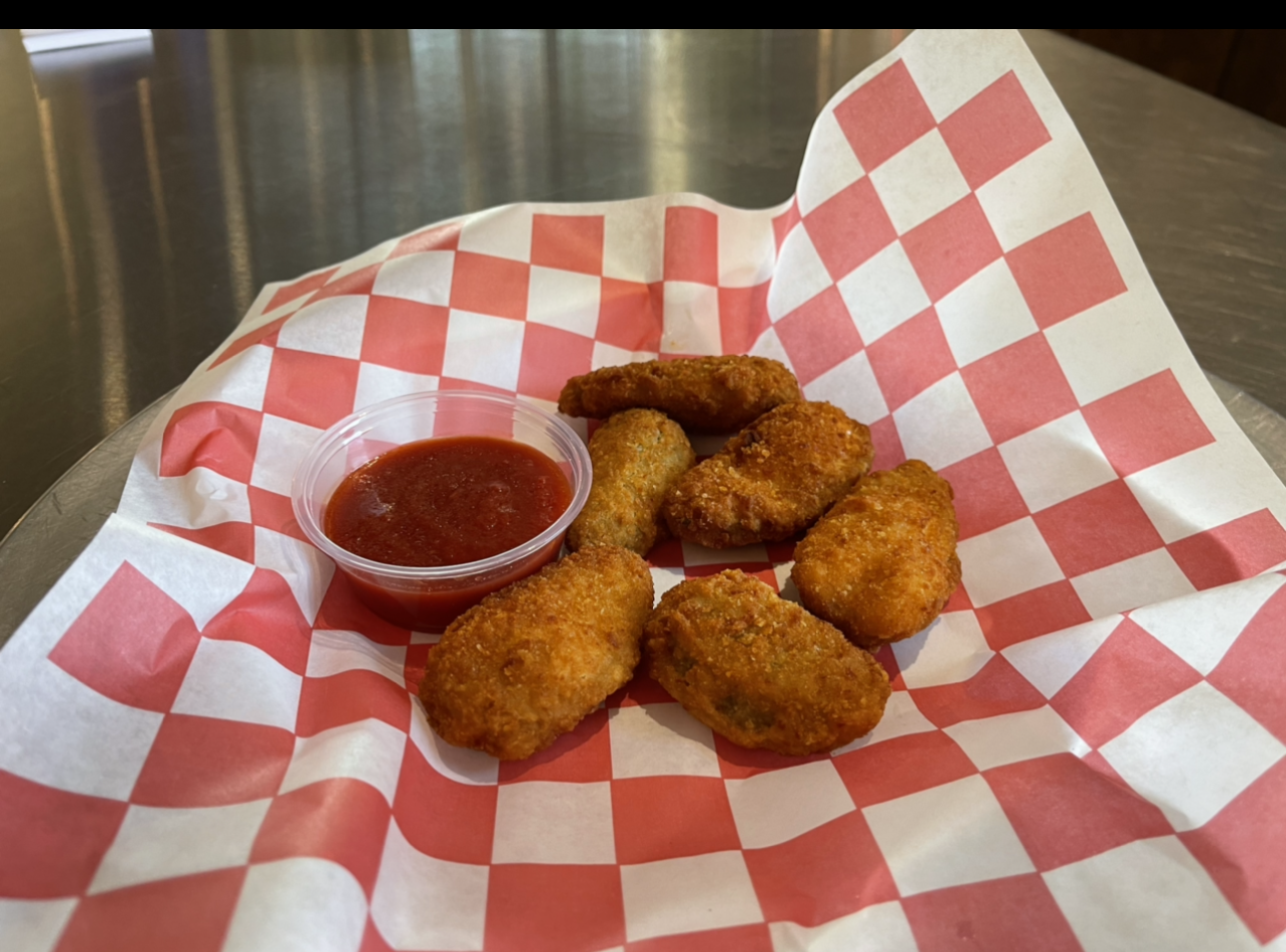 Order Jalapeno Poppers (6 Pcs) food online from Johnny's Pizza store, Cary on bringmethat.com