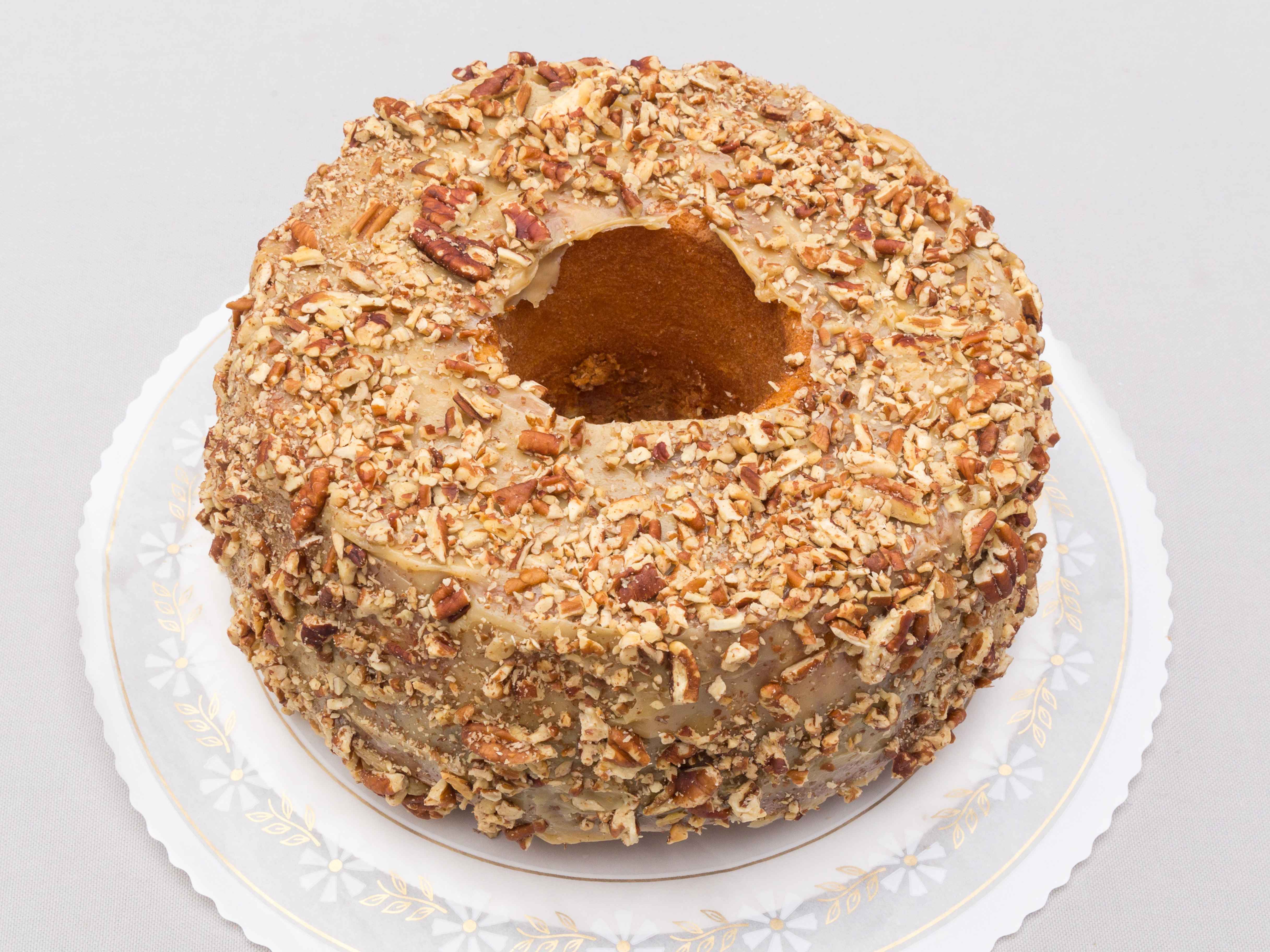 Order 10” Caramel Butter Pecan Pound Cake food online from Yong's Bakery store, Houston on bringmethat.com
