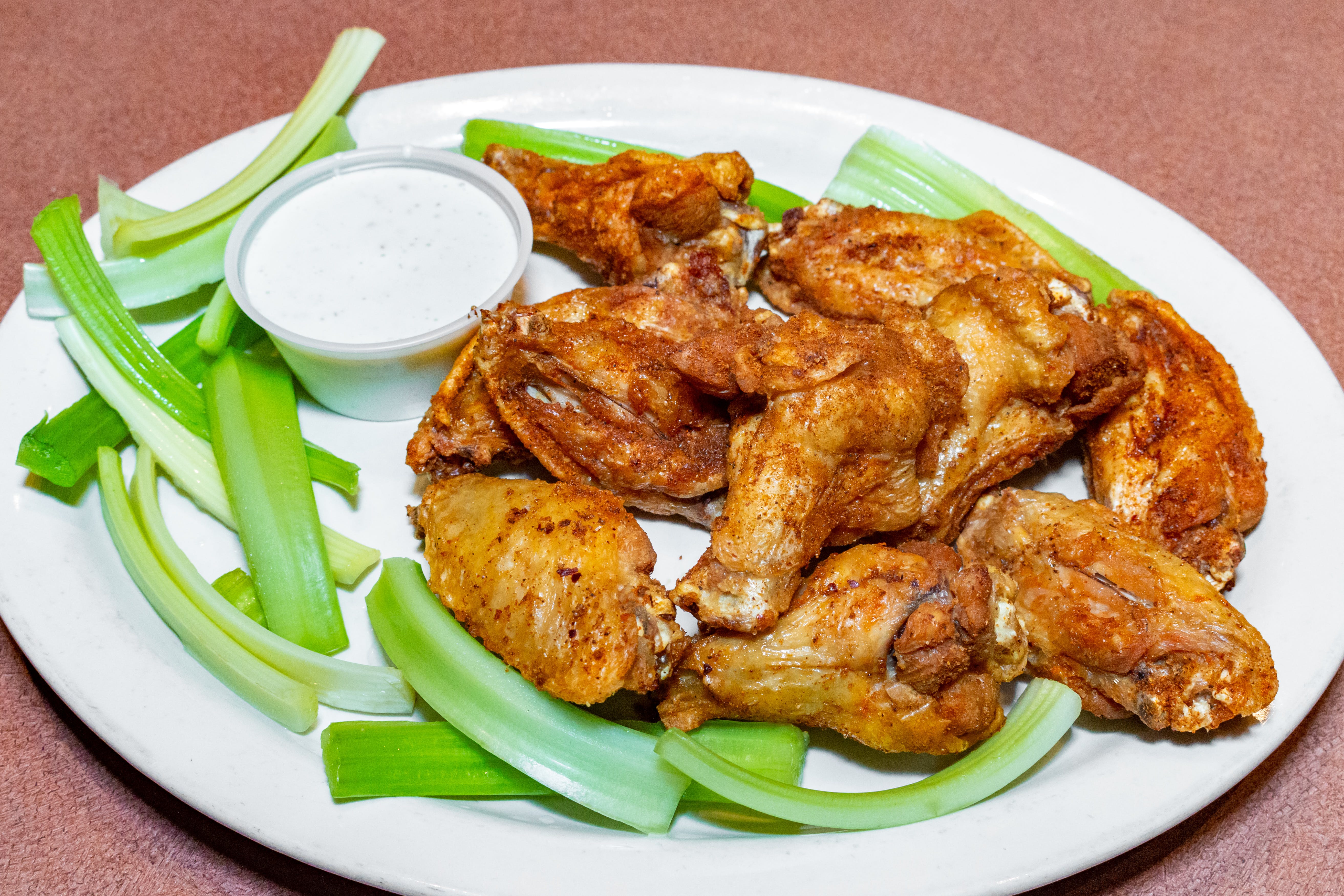 Order Traditional Wings - 10 Pieces food online from Pyramid Pizza & Sports Bar store, Addison on bringmethat.com